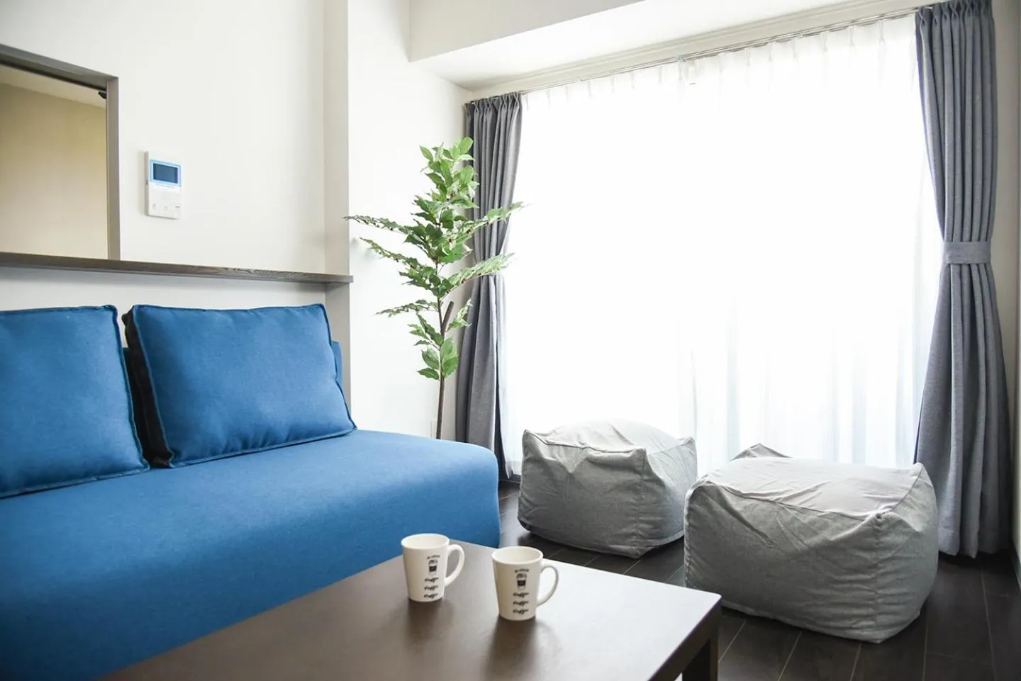 Living room in Sun Court Maruyama Garden Hills