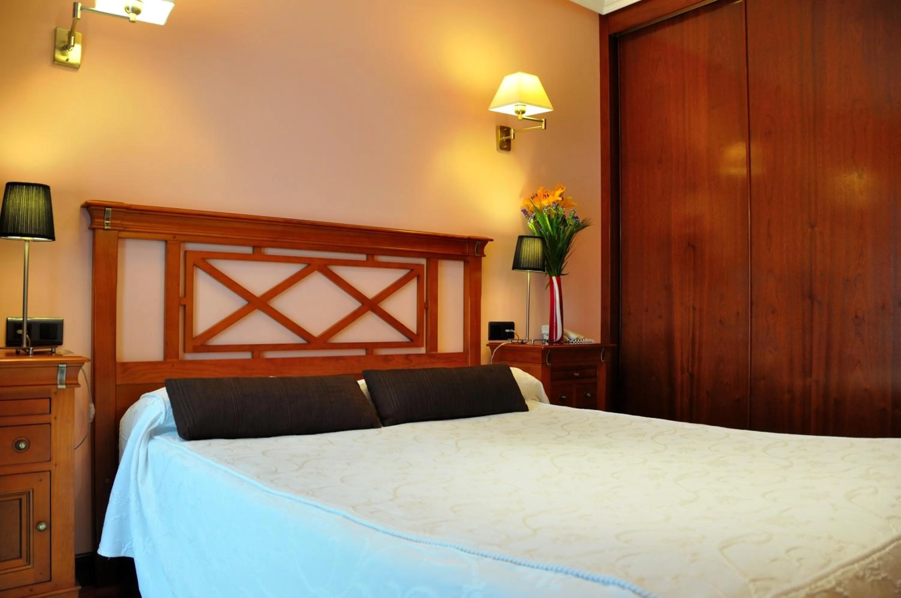 Bed in Hotel Puerta Del Oriente