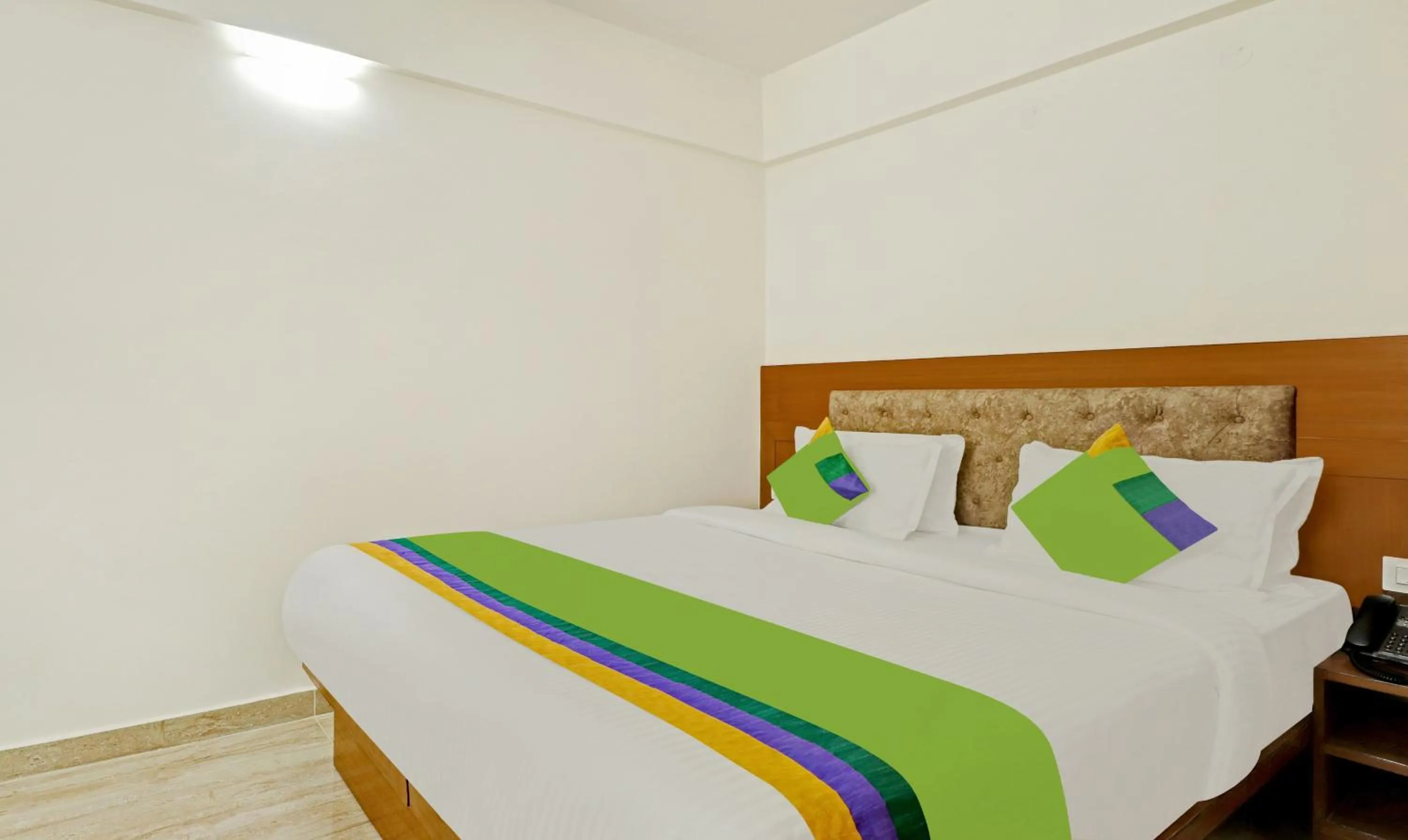 Bed in Treebo Celebrity Hotels And Suites