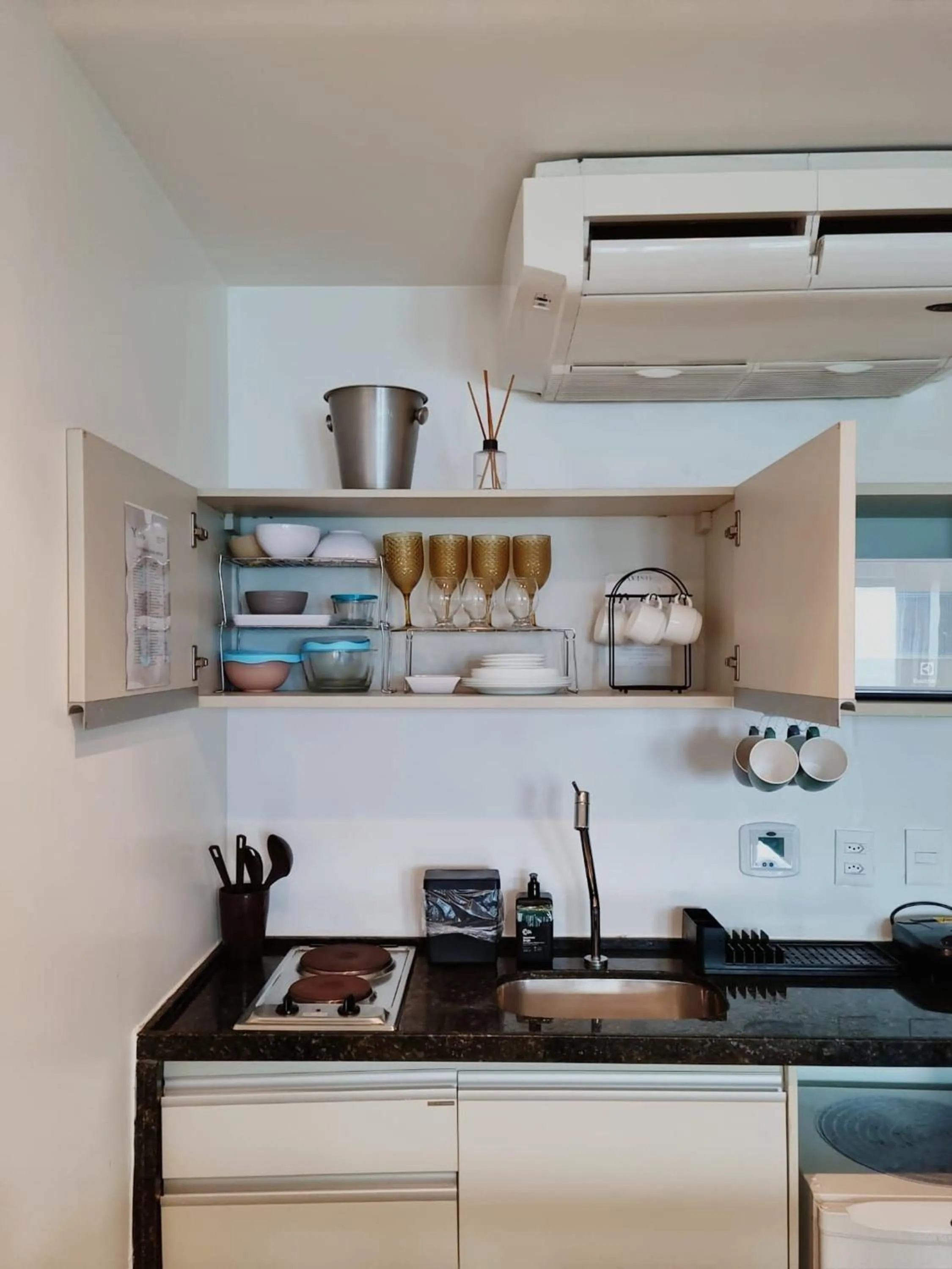 Kitchen or kitchenette in Ritz Suítes-Maceió, Flat a Beira mar de temporada