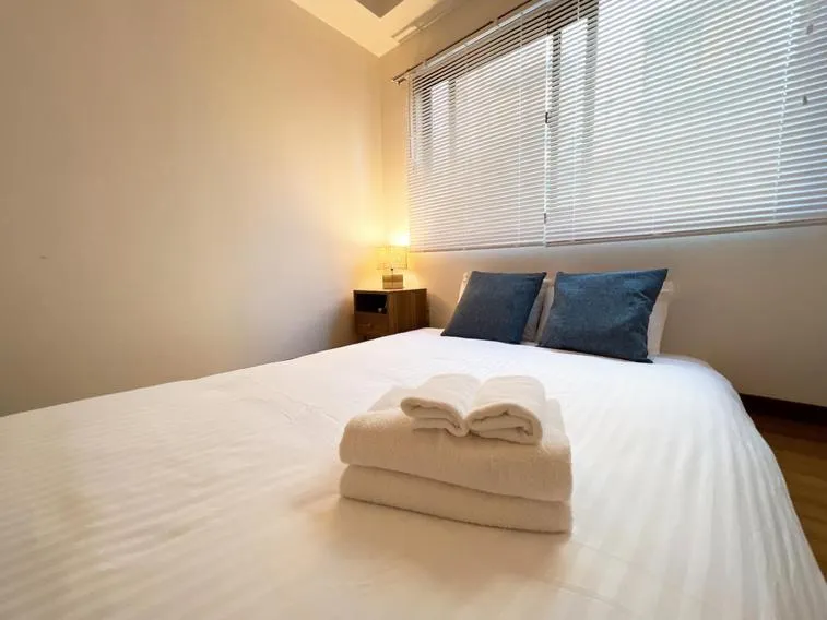 Bed in PINE TREE HOTEL