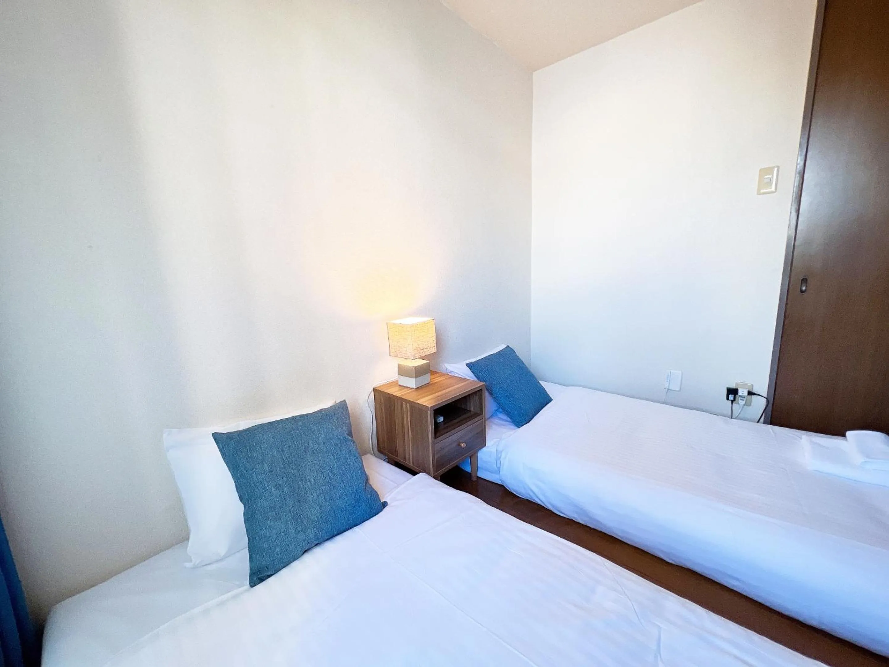 Bed in PINE TREE HOTEL