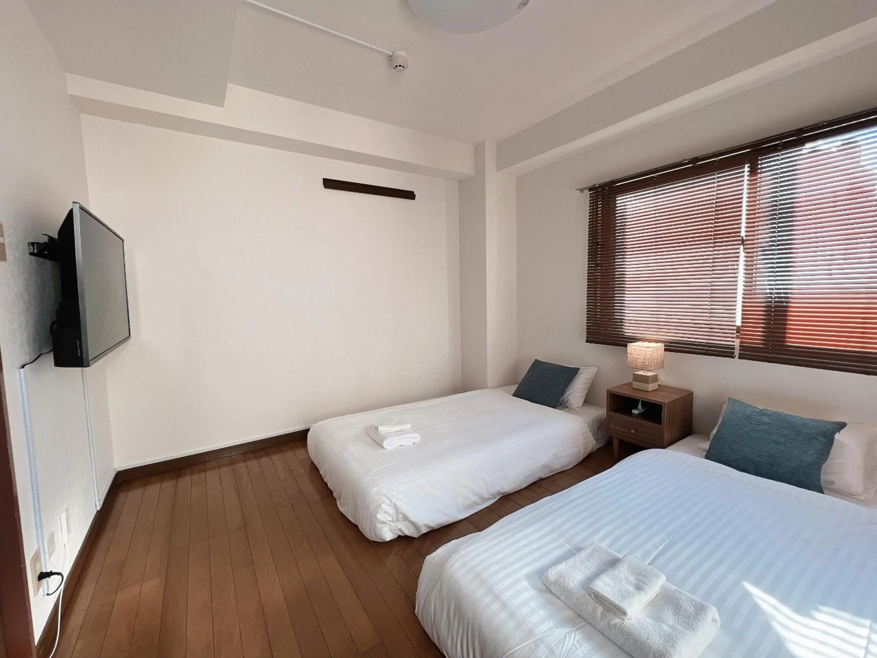 Bed in PINE TREE HOTEL