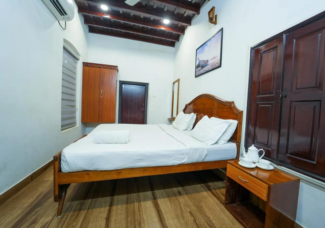 Photo of the whole room, Bed in Pop Tavern Kovalam Beach Villa by VOYE HOMES