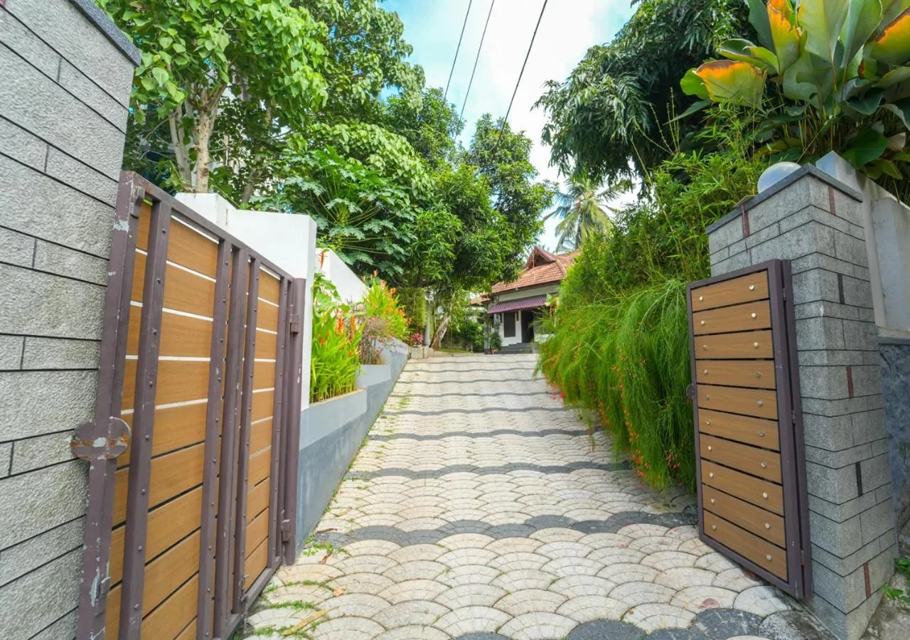 Facade/entrance in Pop Tavern Kovalam Beach Villa by VOYE HOMES