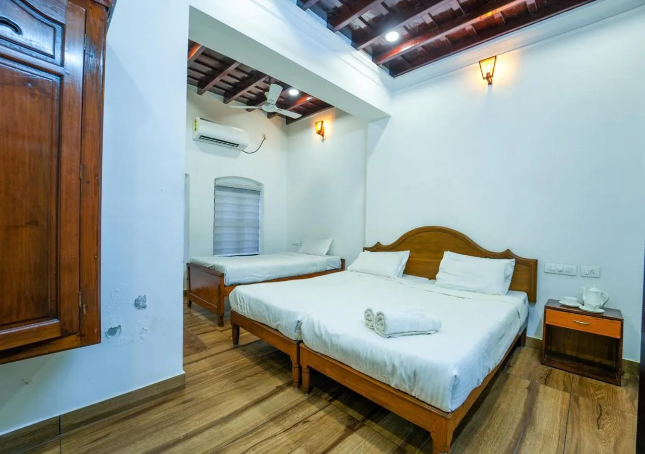 Photo of the whole room, Bed in Pop Tavern Kovalam Beach Villa by VOYE HOMES