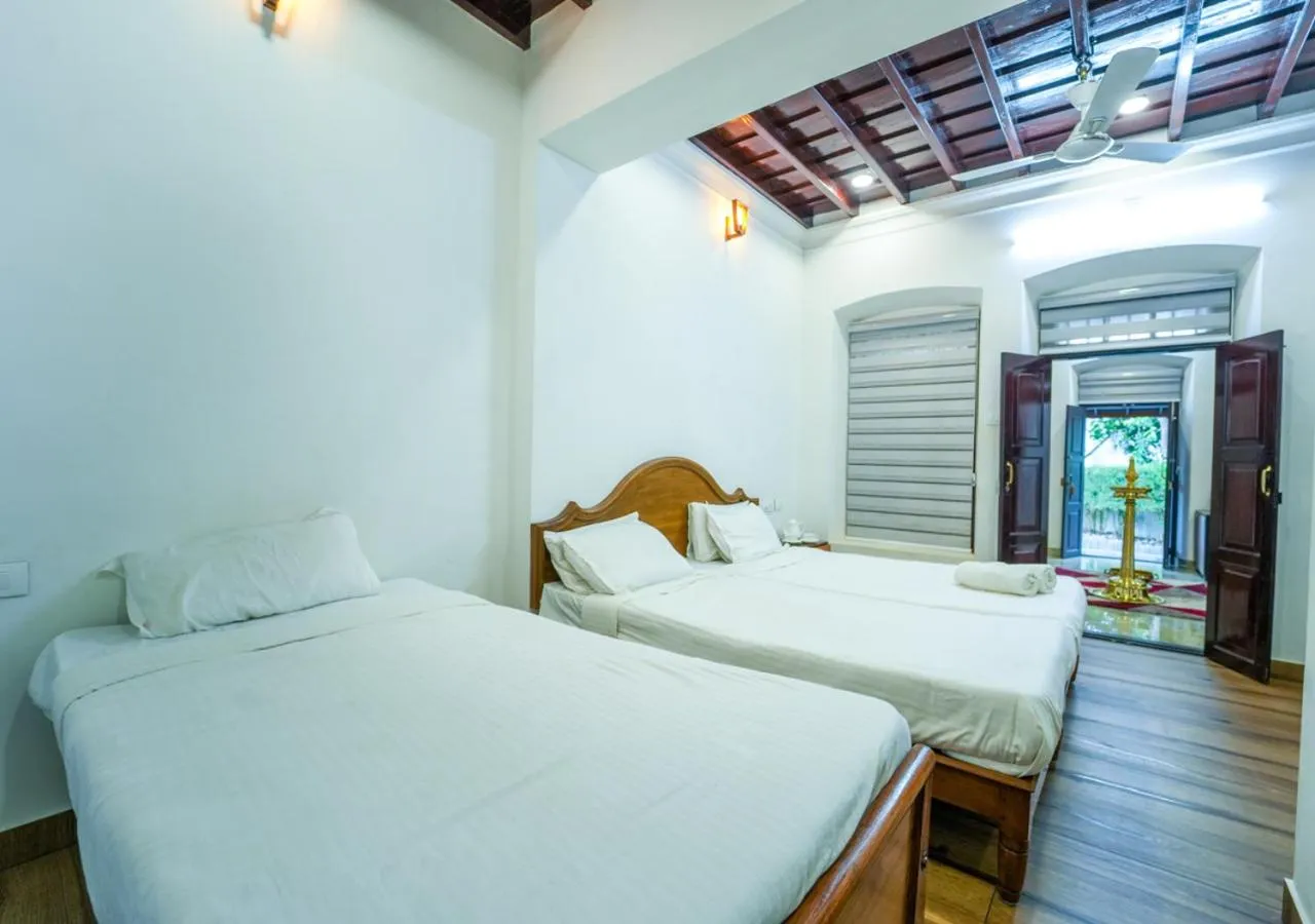 Photo of the whole room, Bed in Pop Tavern Kovalam Beach Villa by VOYE HOMES