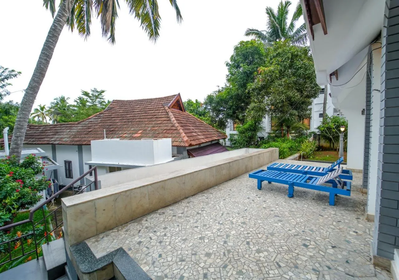 Garden in Pop Tavern Kovalam Beach Villa by VOYE HOMES