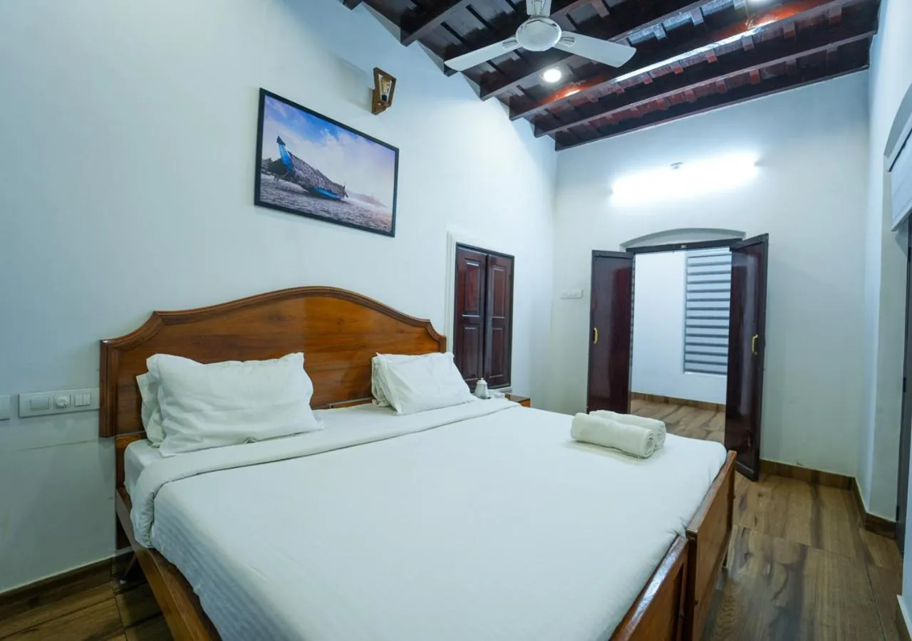 Photo of the whole room, Bed in Pop Tavern Kovalam Beach Villa by VOYE HOMES
