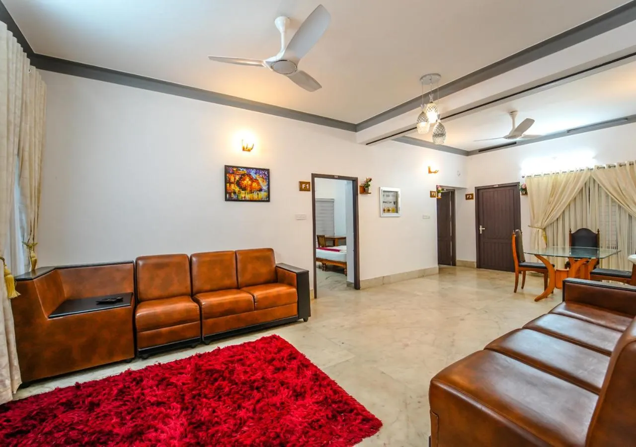 Seating area in Pop Tavern Kovalam Beach Villa by VOYE HOMES