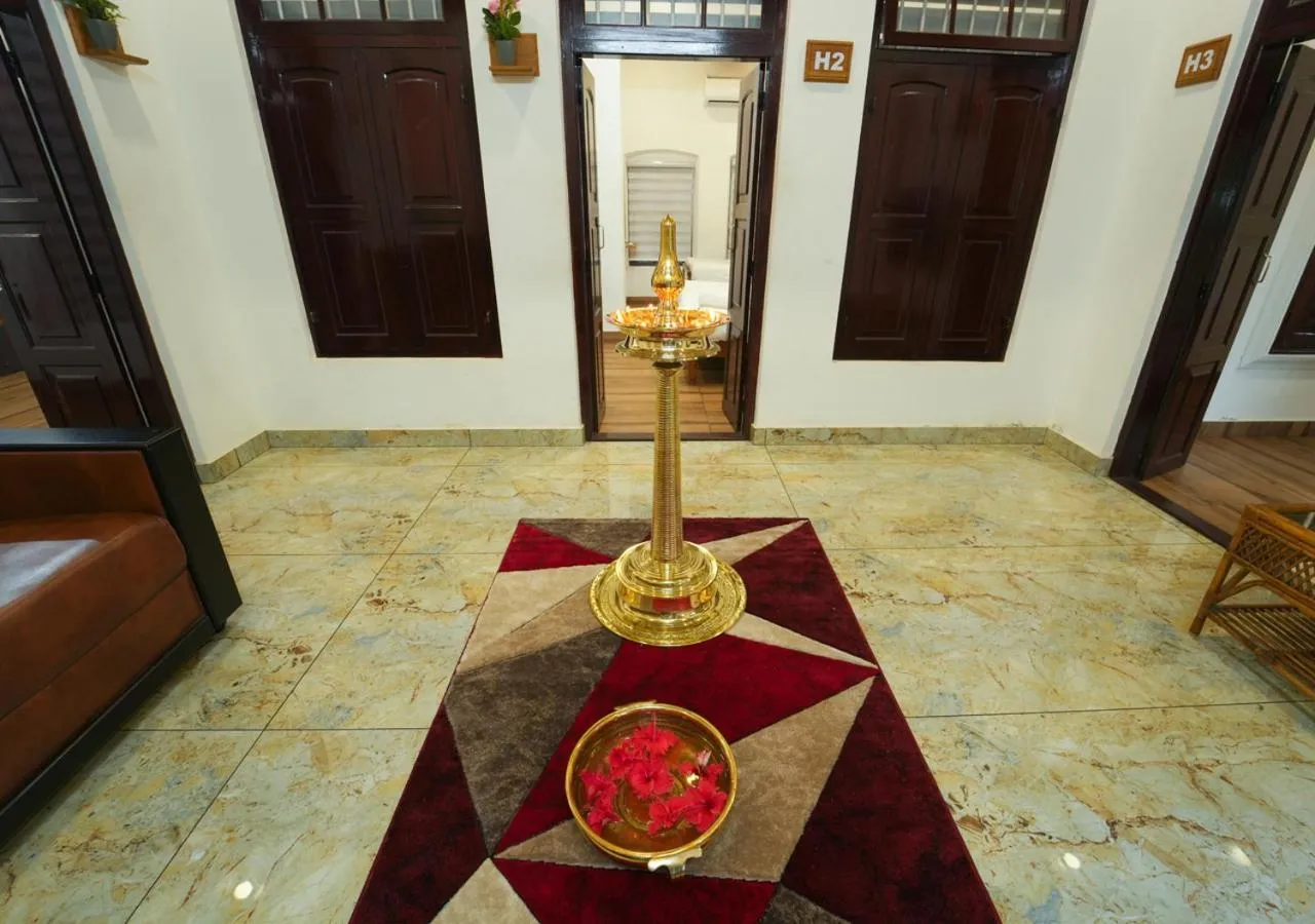 Living room in Pop Tavern Kovalam Beach Villa by VOYE HOMES