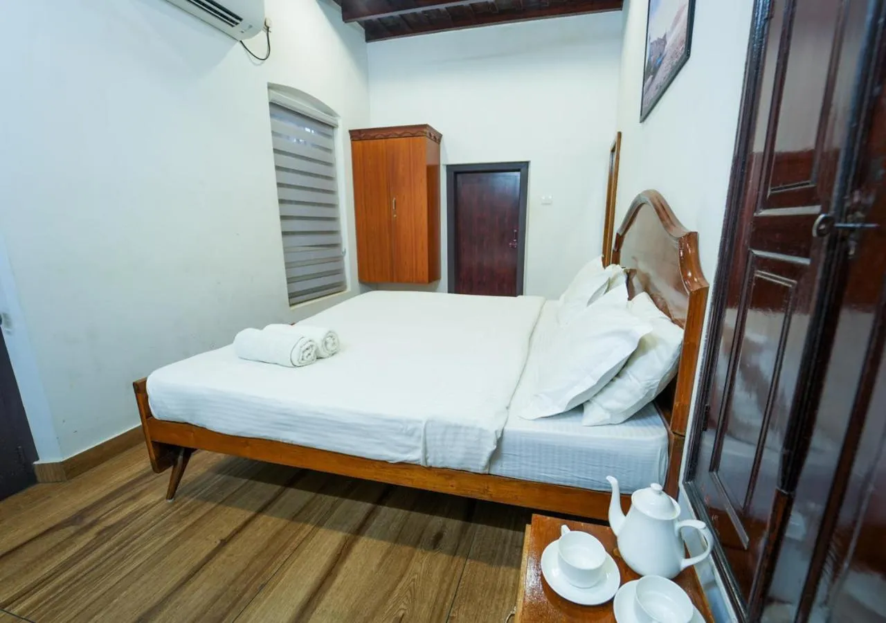 Photo of the whole room, Bed in Pop Tavern Kovalam Beach Villa by VOYE HOMES
