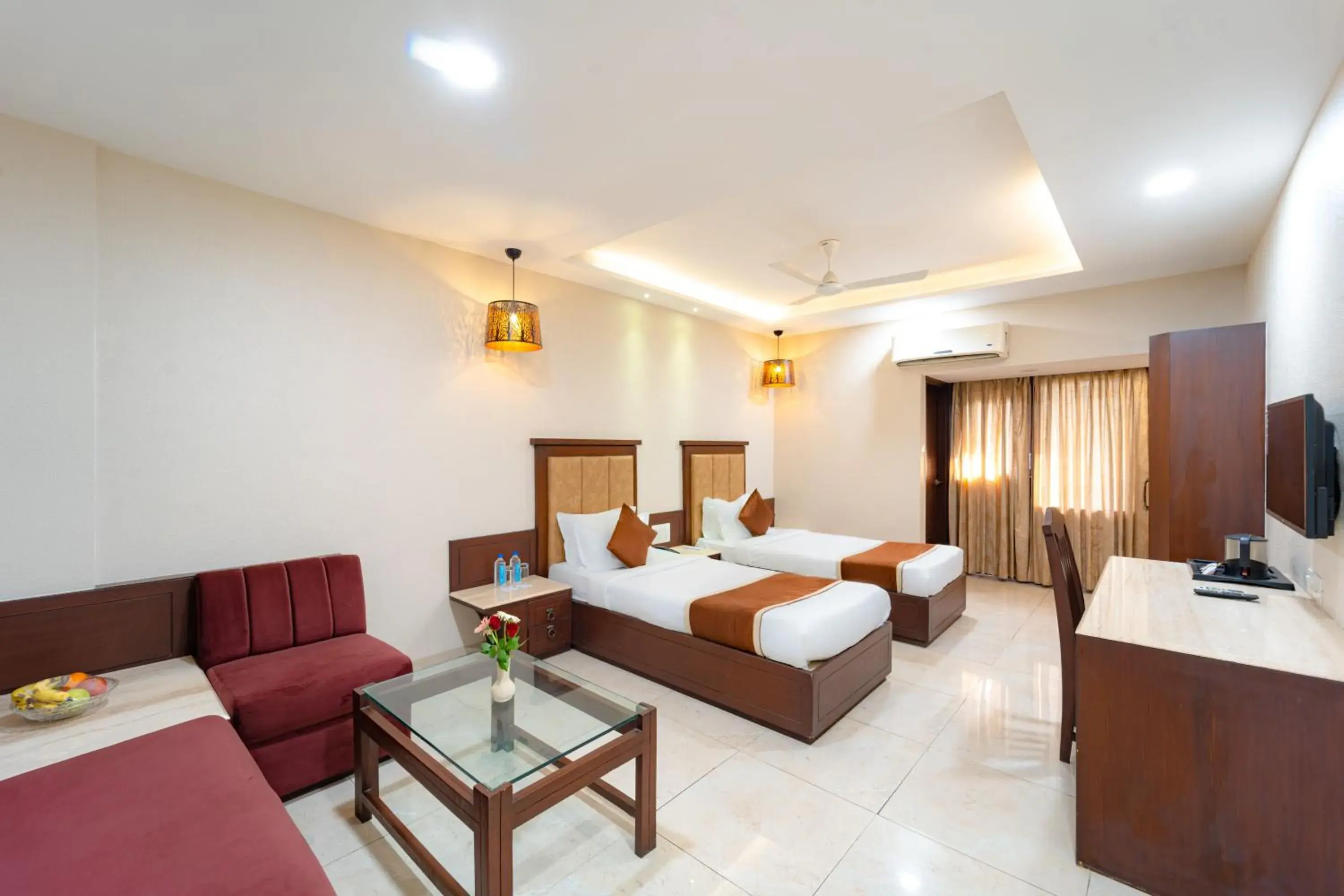 Communal lounge/ TV room, Bed in Enrise by Sayaji Harda Communal lounge/ TV room, Bed in Enrise by Sayaji Harda