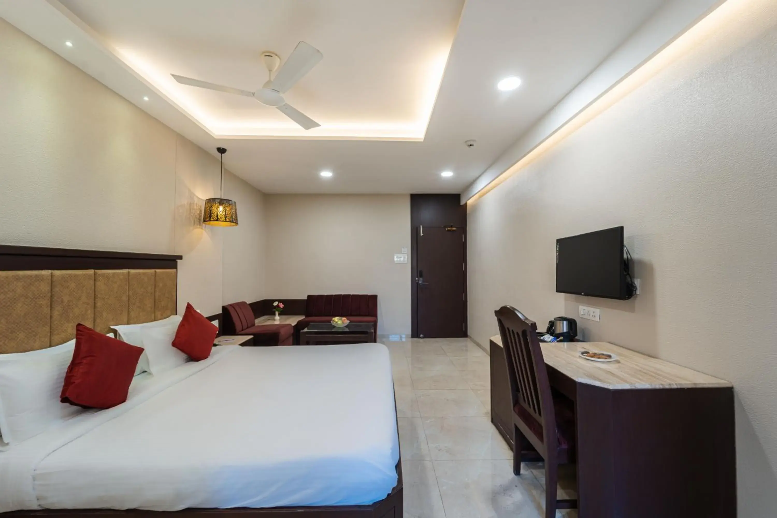 Communal lounge/ TV room, Bed in Enrise by Sayaji Harda Communal lounge/ TV room, Bed in Enrise by Sayaji Harda