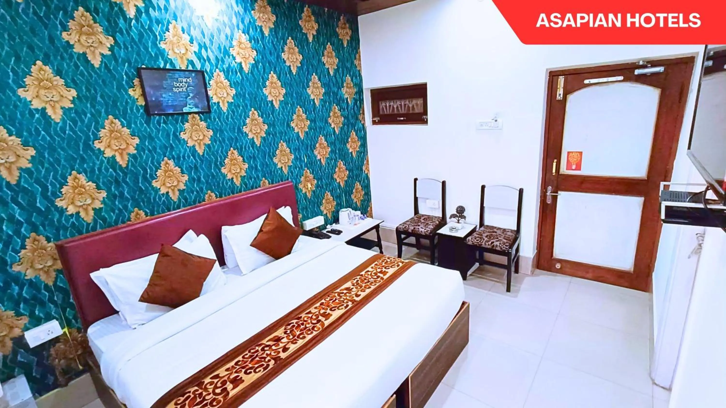 Bed in Hotel Vijay Deluxe