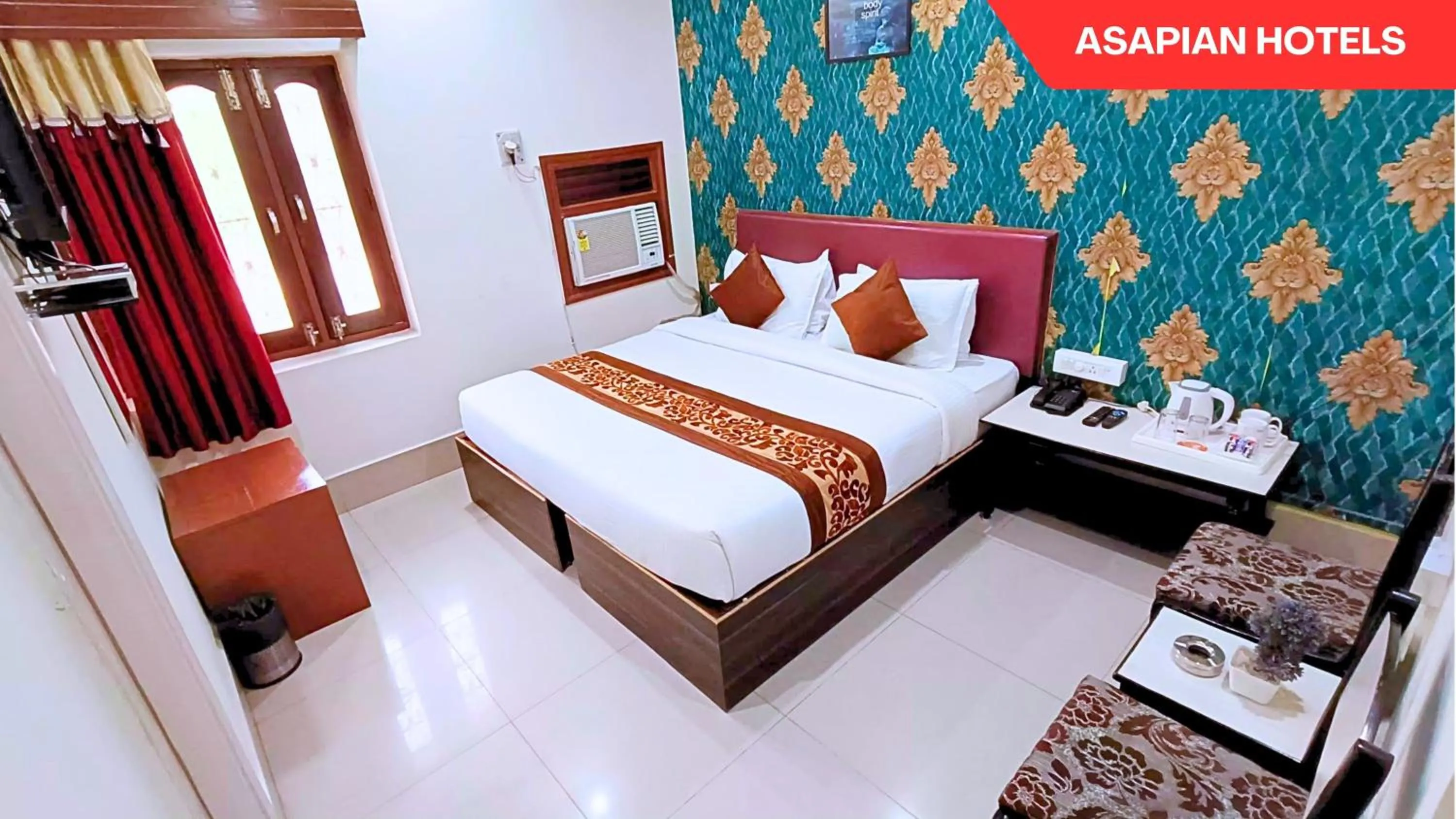 Bed in Hotel Vijay Deluxe