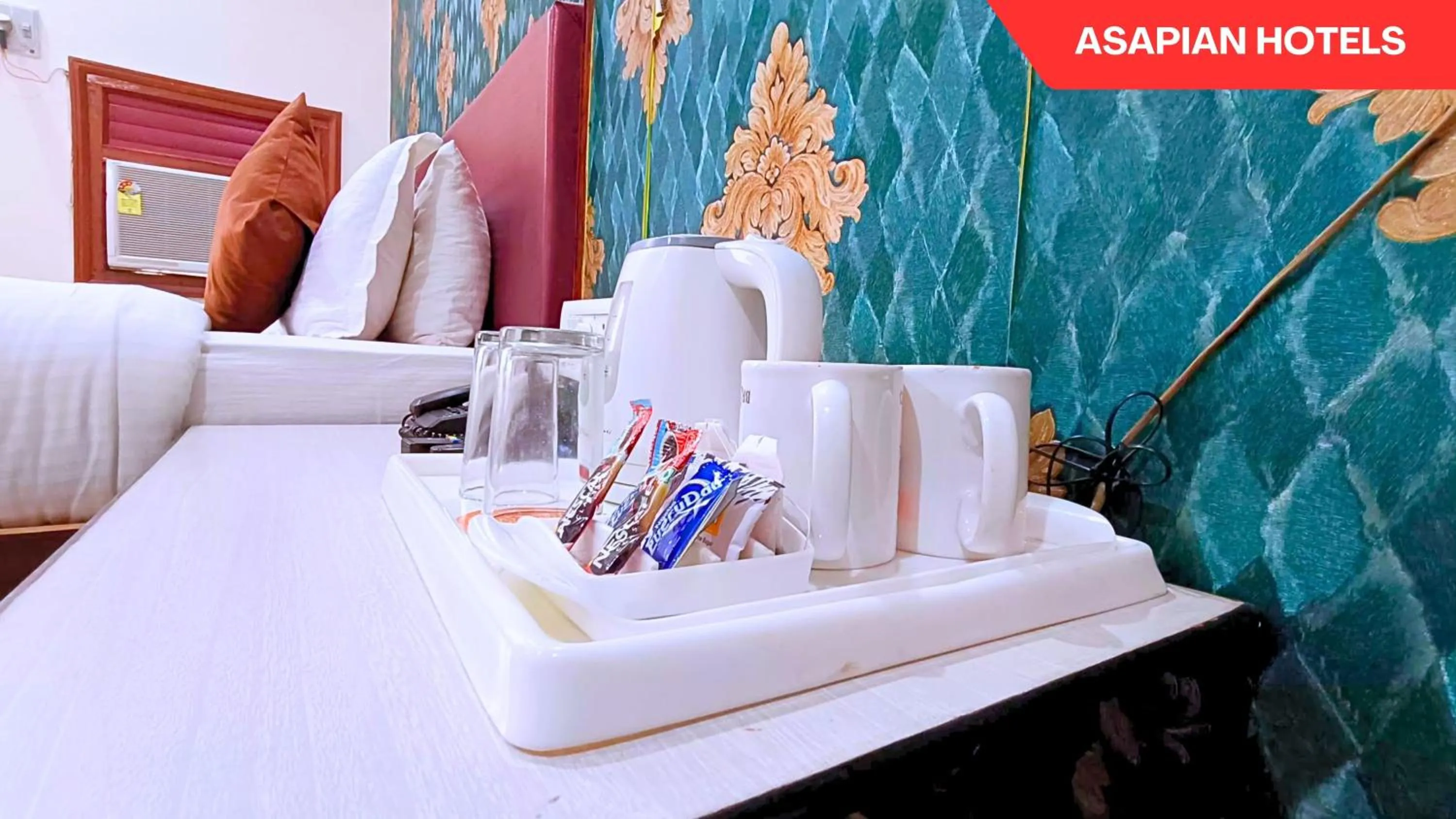 Bed in Hotel Vijay Deluxe