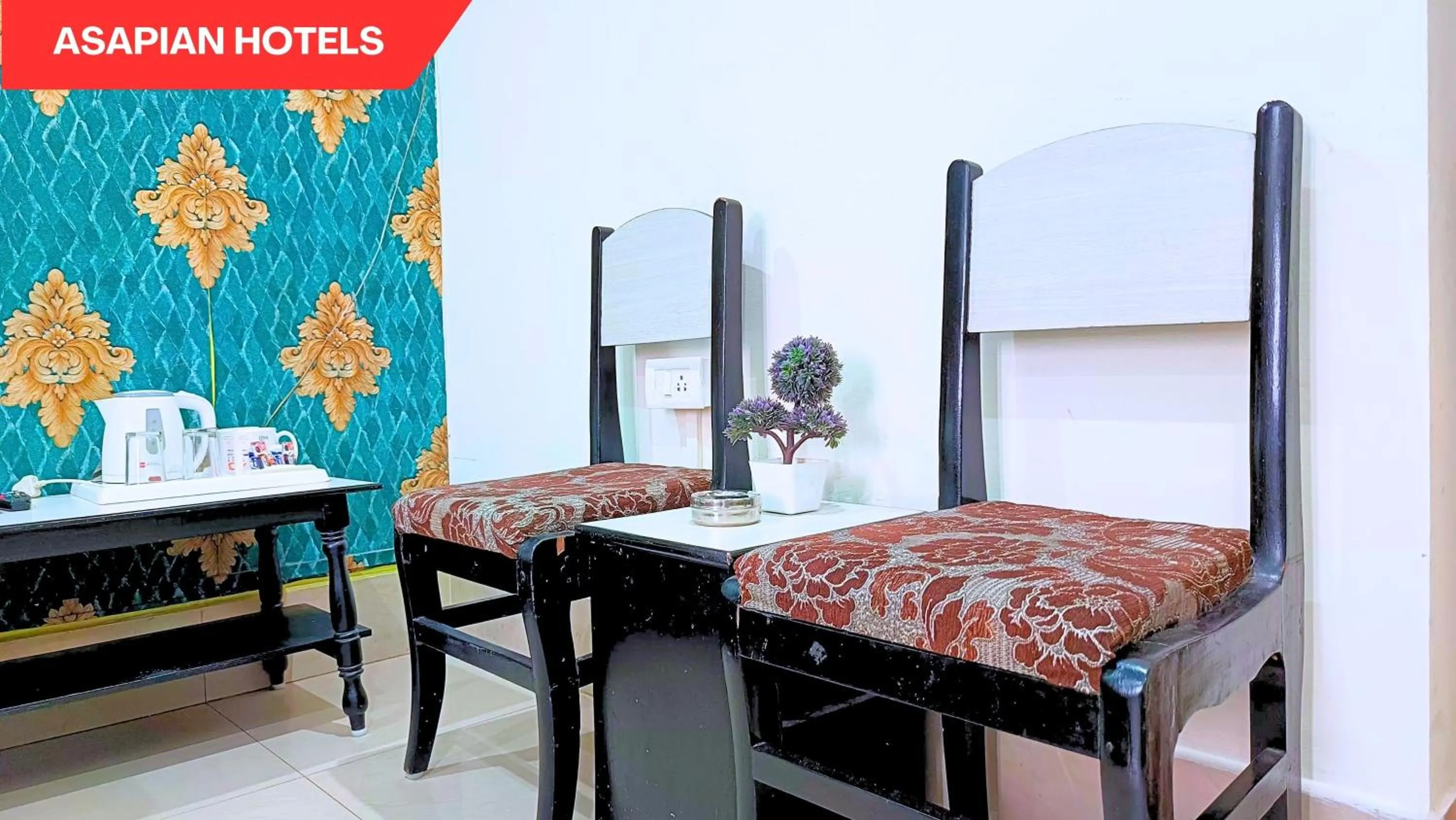 Bed in Hotel Vijay Deluxe