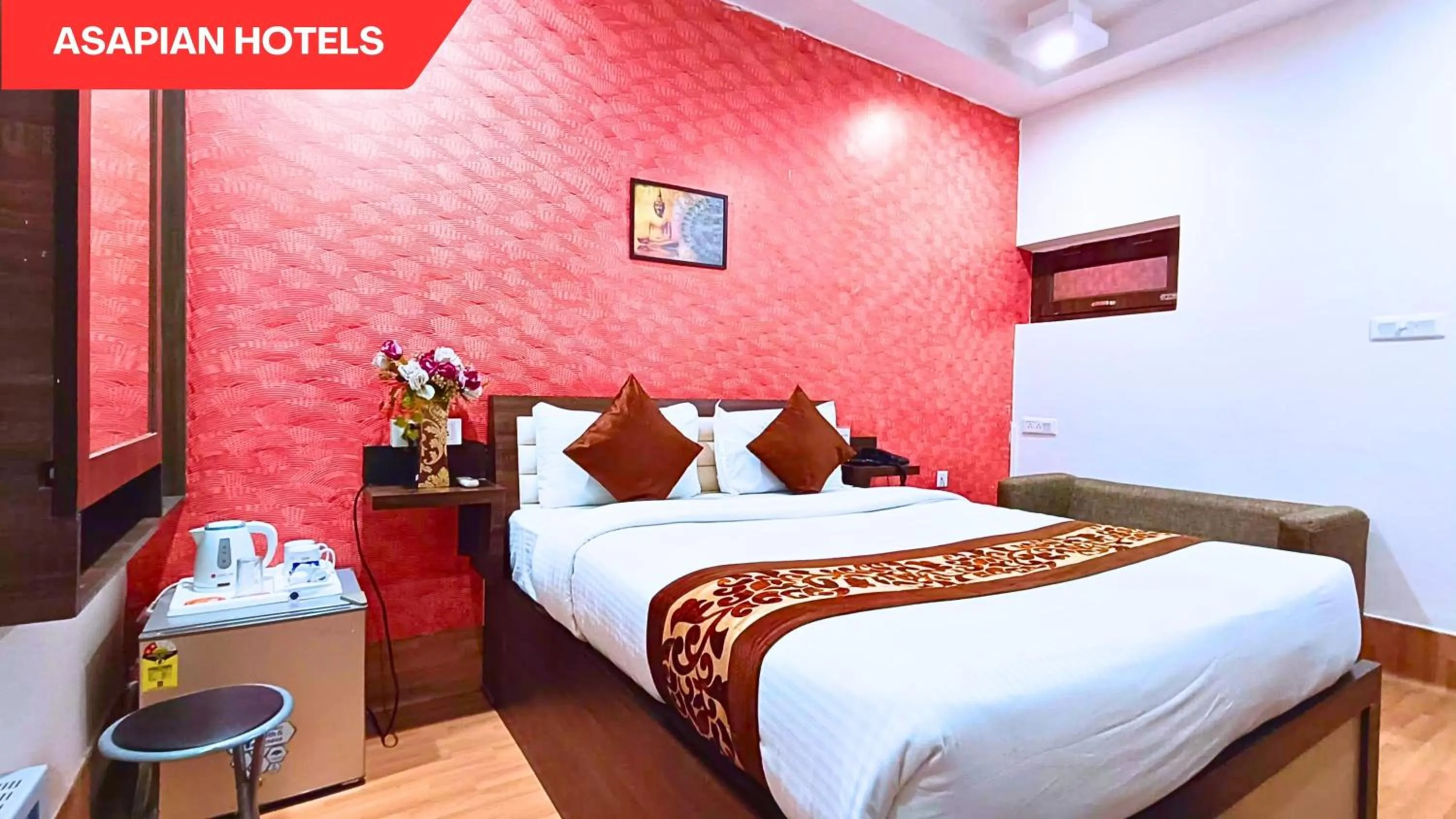 Bed in Hotel Vijay Deluxe