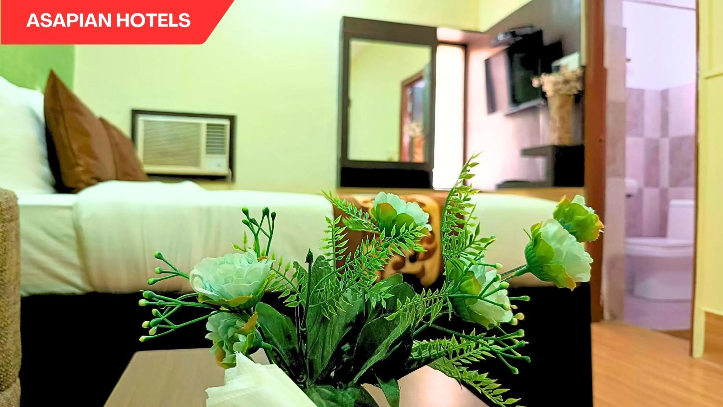 Bed in Hotel Vijay Deluxe