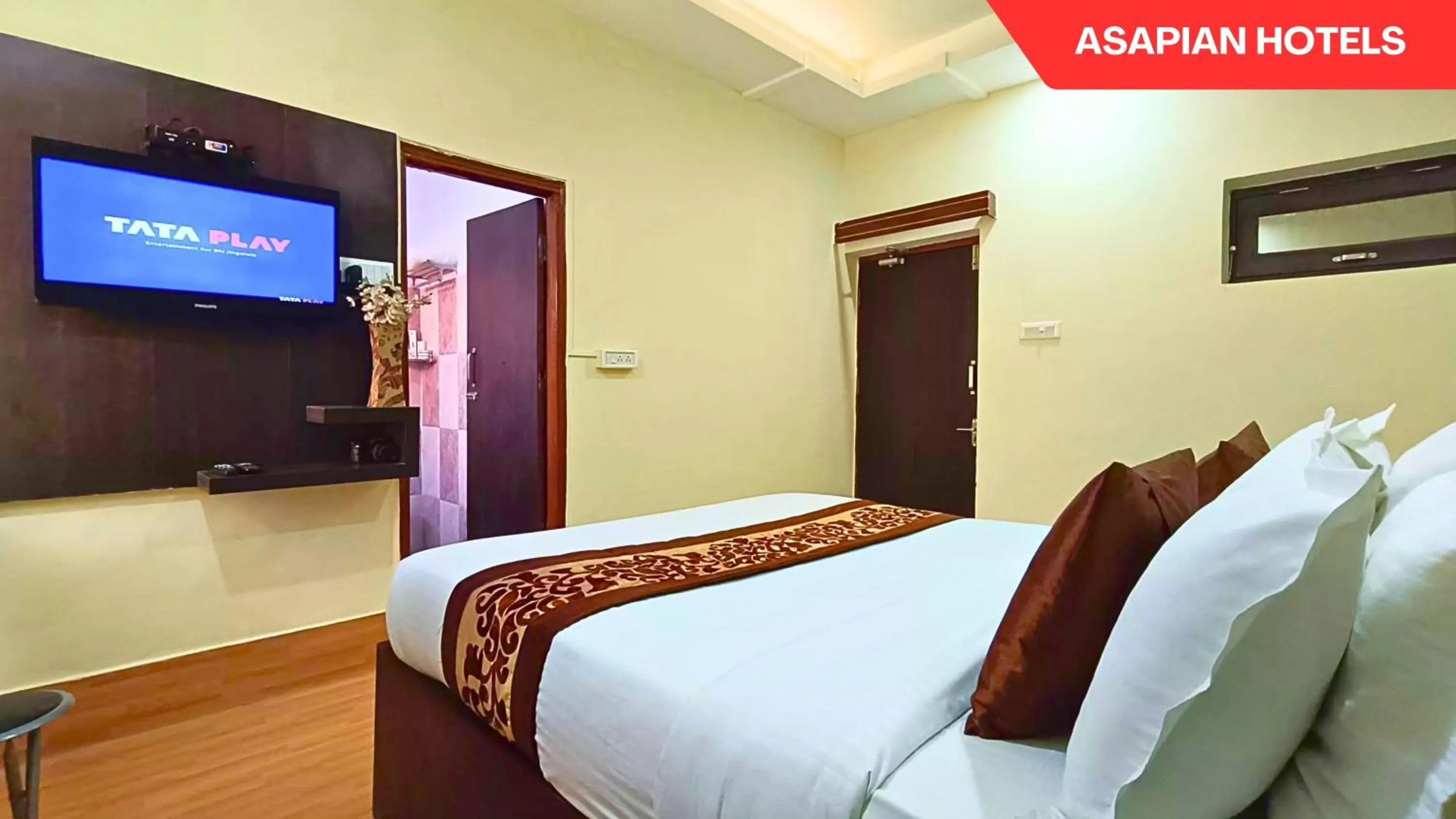 Bed in Hotel Vijay Deluxe