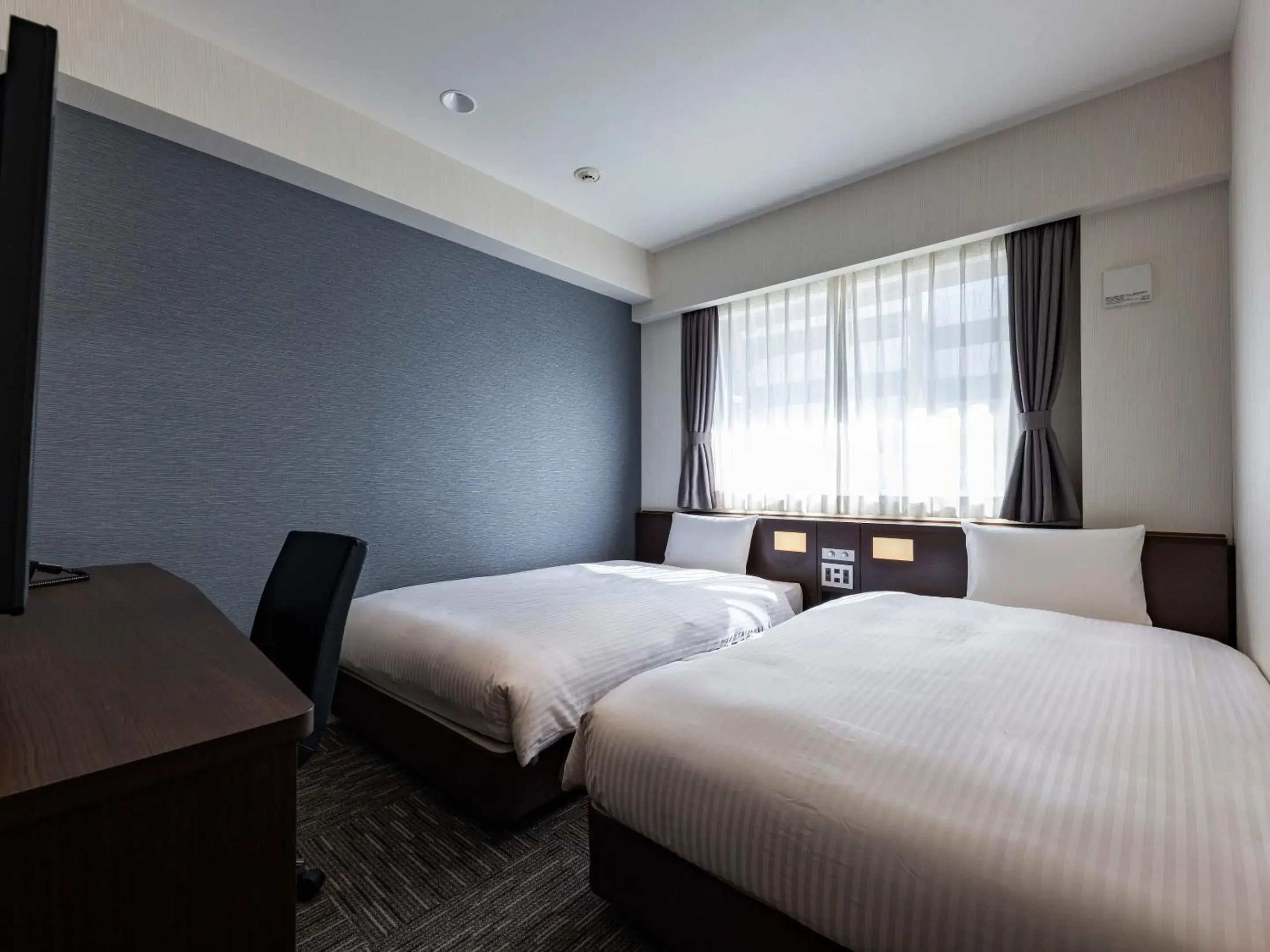 Photo of the whole room, Bed in KOKO HOTEL Osaka Shinsekai - formerly Hotel Wing Premium Osaka Shinsekai Photo of the whole room, Bed in KOKO HOTEL Osaka Shinsekai - formerly Hotel Wing Premium Osaka Shinsekai