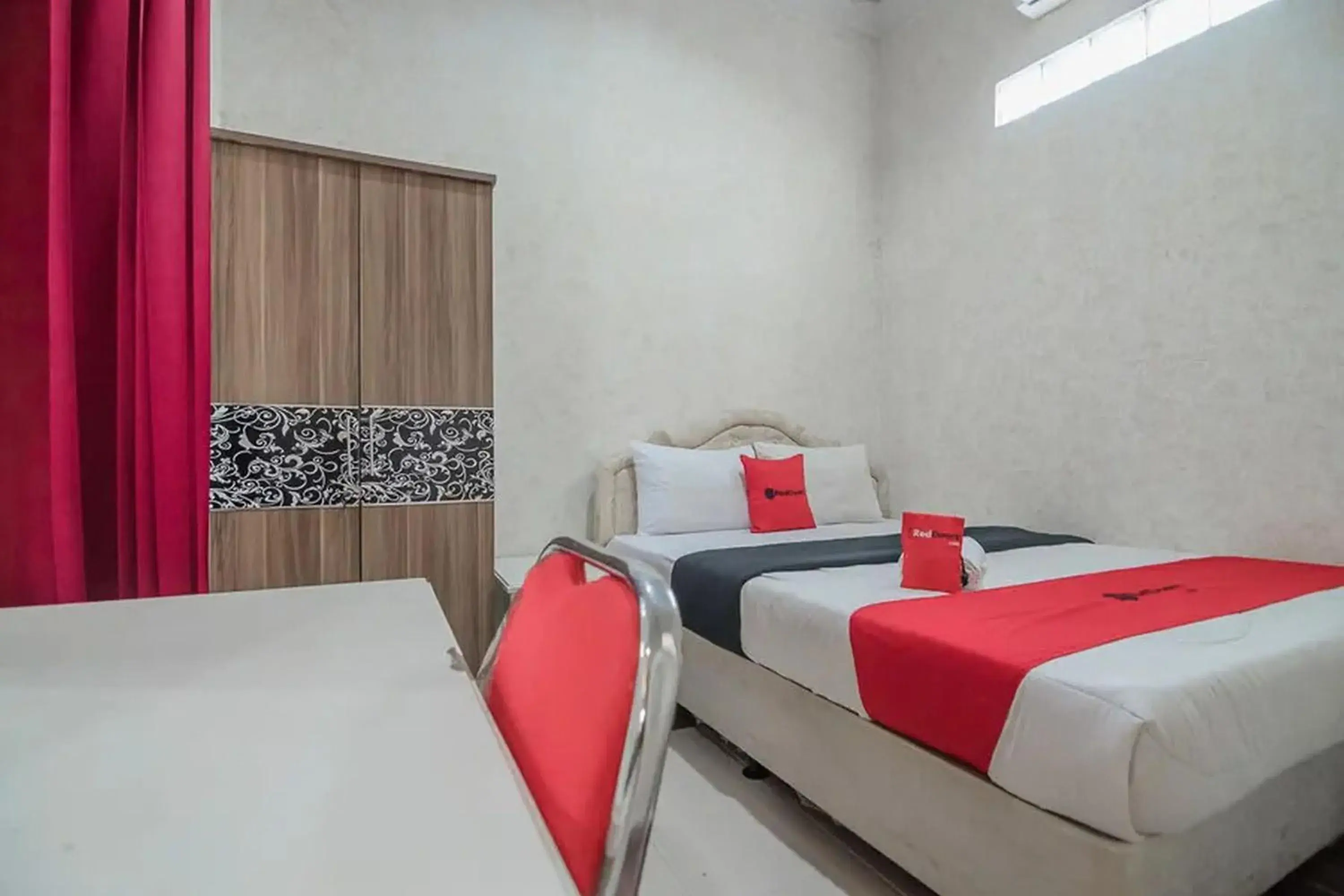 Bedroom, Bed in RedDoorz Syariah at Jalan Ahmad Yani Jambi Bedroom, Bed in RedDoorz Syariah at Jalan Ahmad Yani Jambi