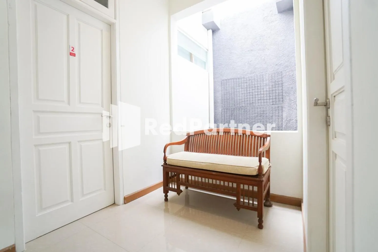 Living room in Fazza Syariah Mitra RedDoorz