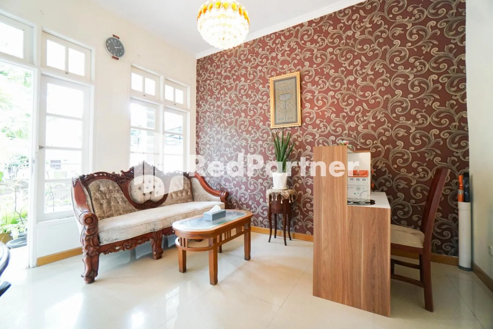 Living room in Fazza Syariah Mitra RedDoorz