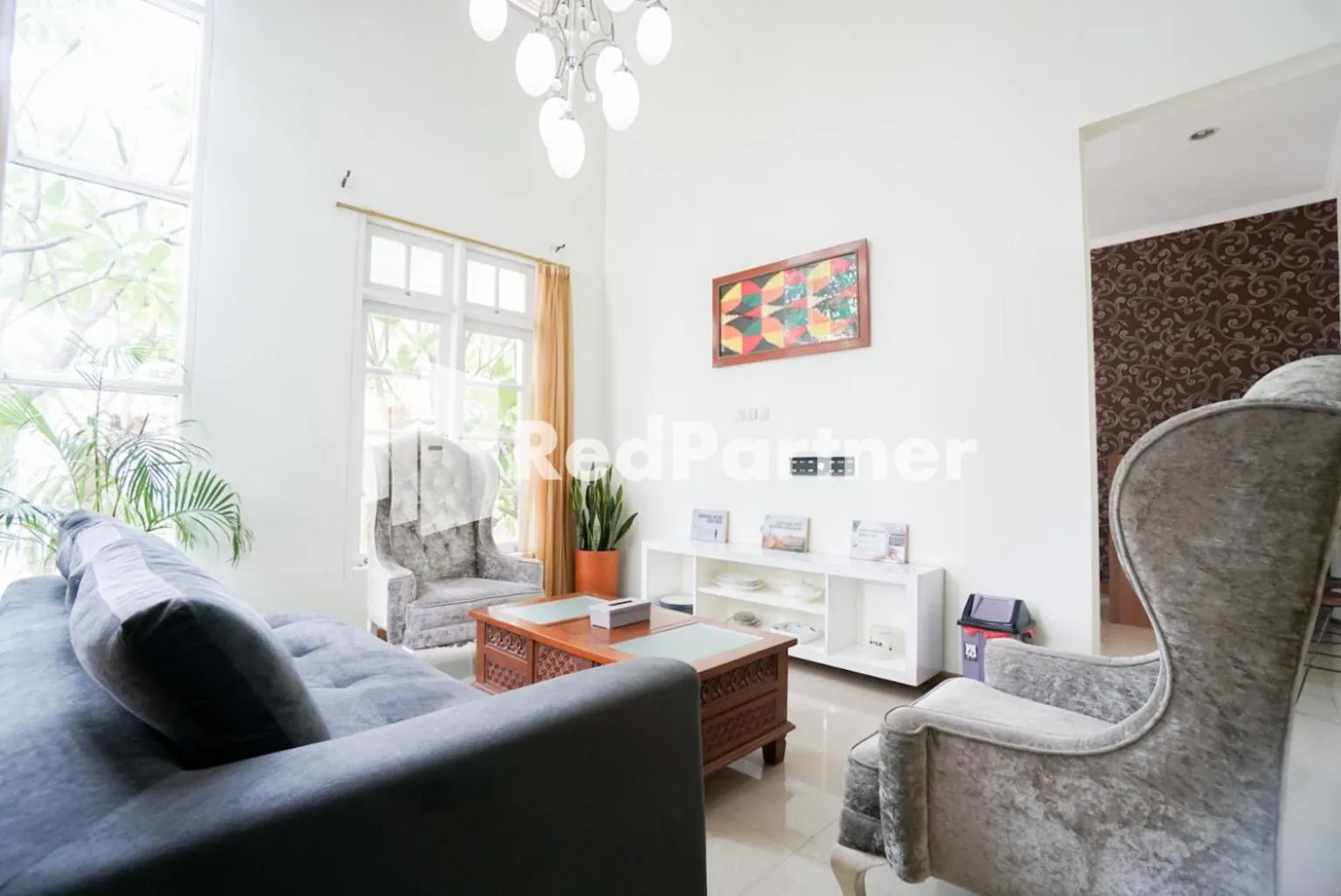 Living room in Fazza Syariah Mitra RedDoorz