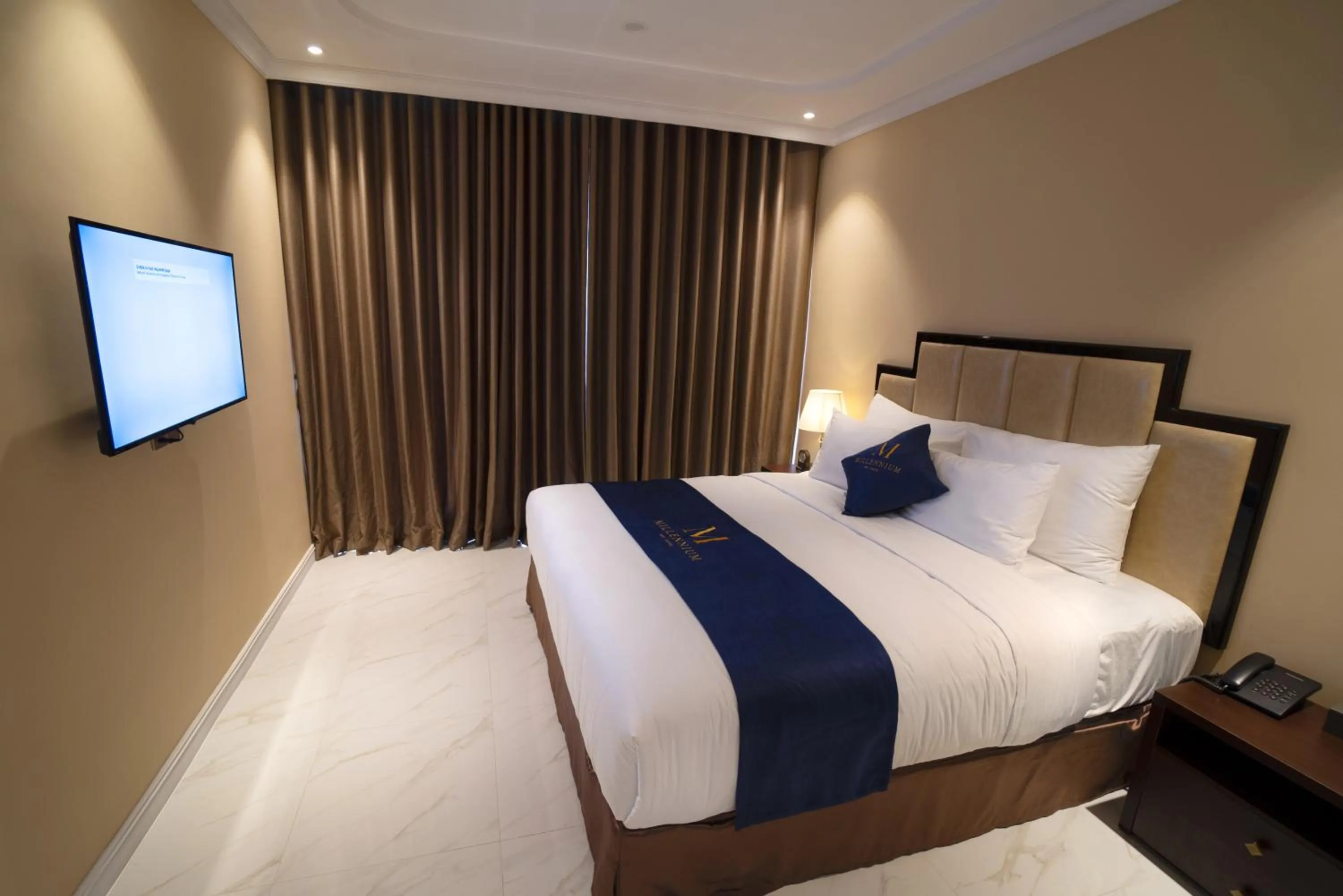 Bed in Millennium Hue Hotel