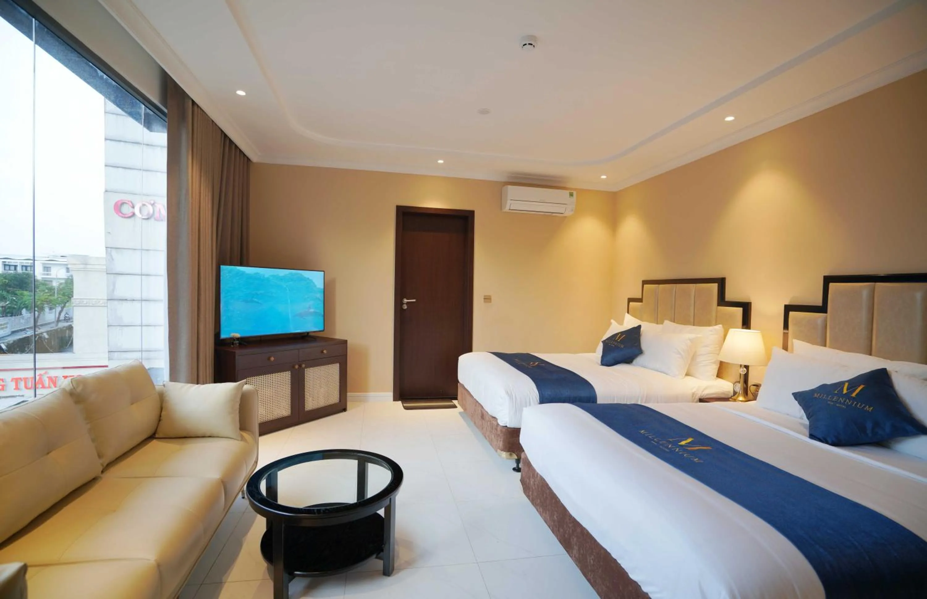 Bed in Millennium Hue Hotel