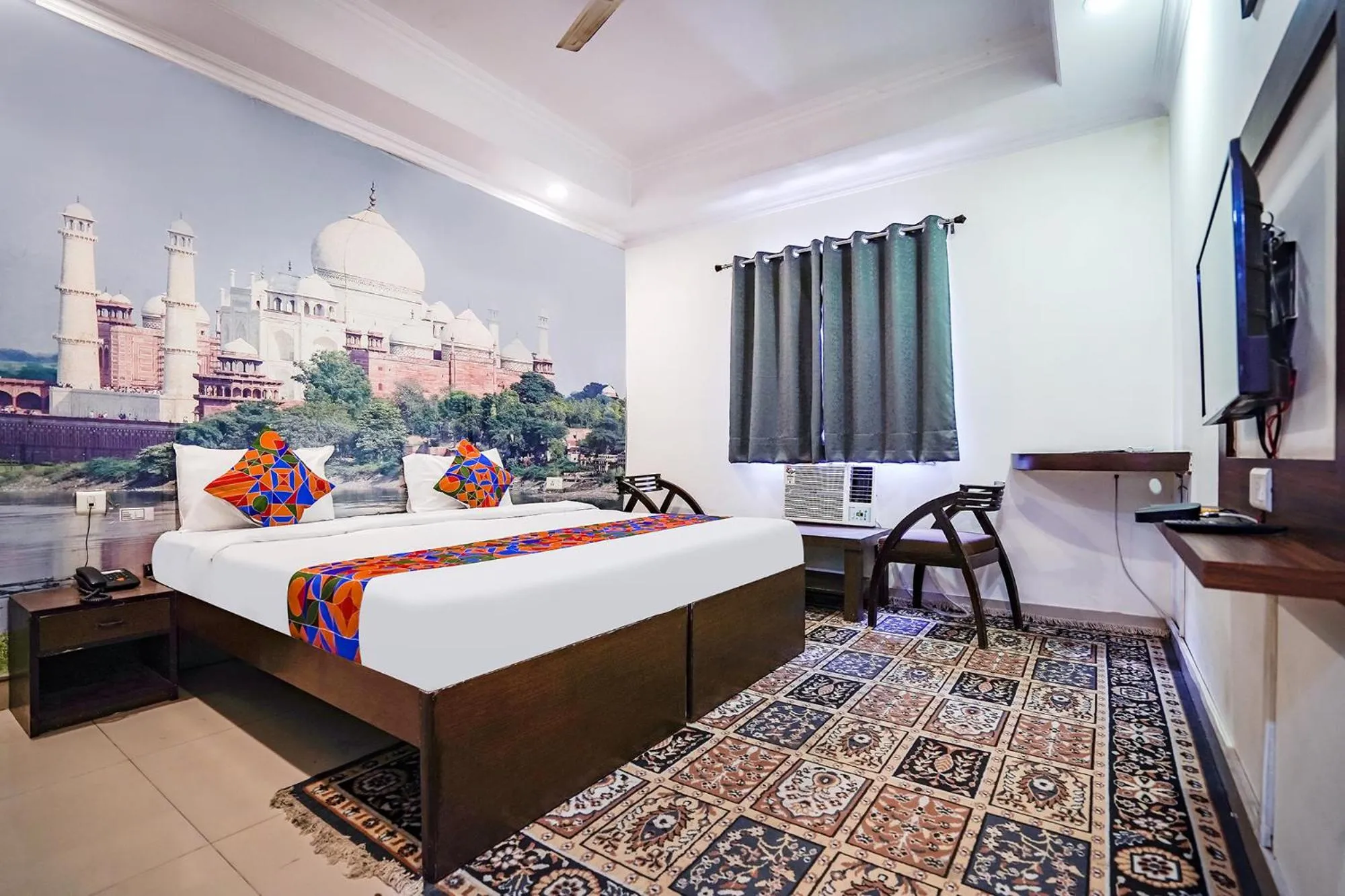 Bed in FabHotel Taj Heritage