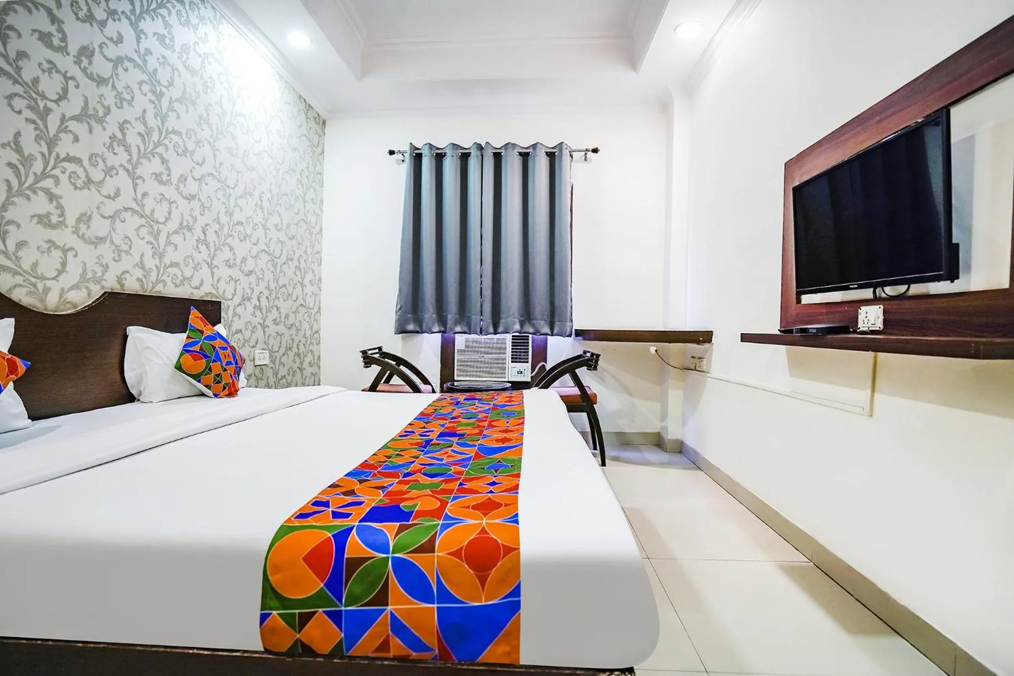 Bed in FabHotel Taj Heritage