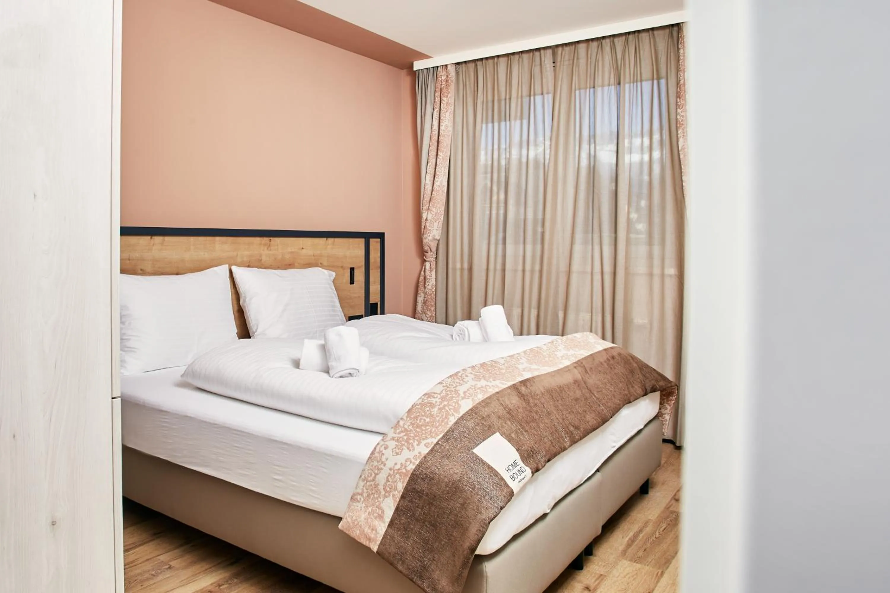 Bed in HOMEBOUND APARTMENTS Bad Goisern - contactless check-in