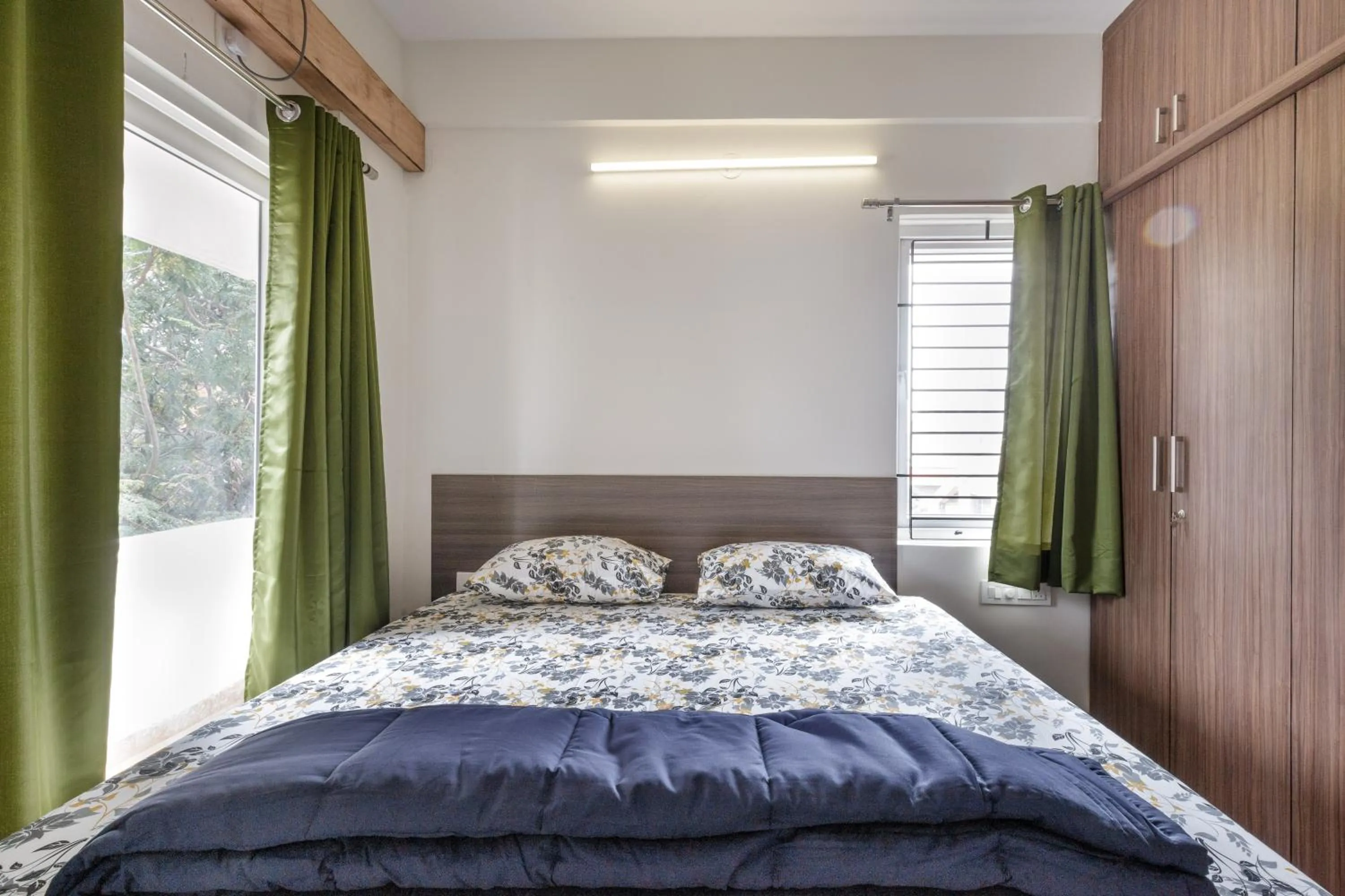 Bed in SPLENDID SHUBHAM SERVICED APARTMENTS