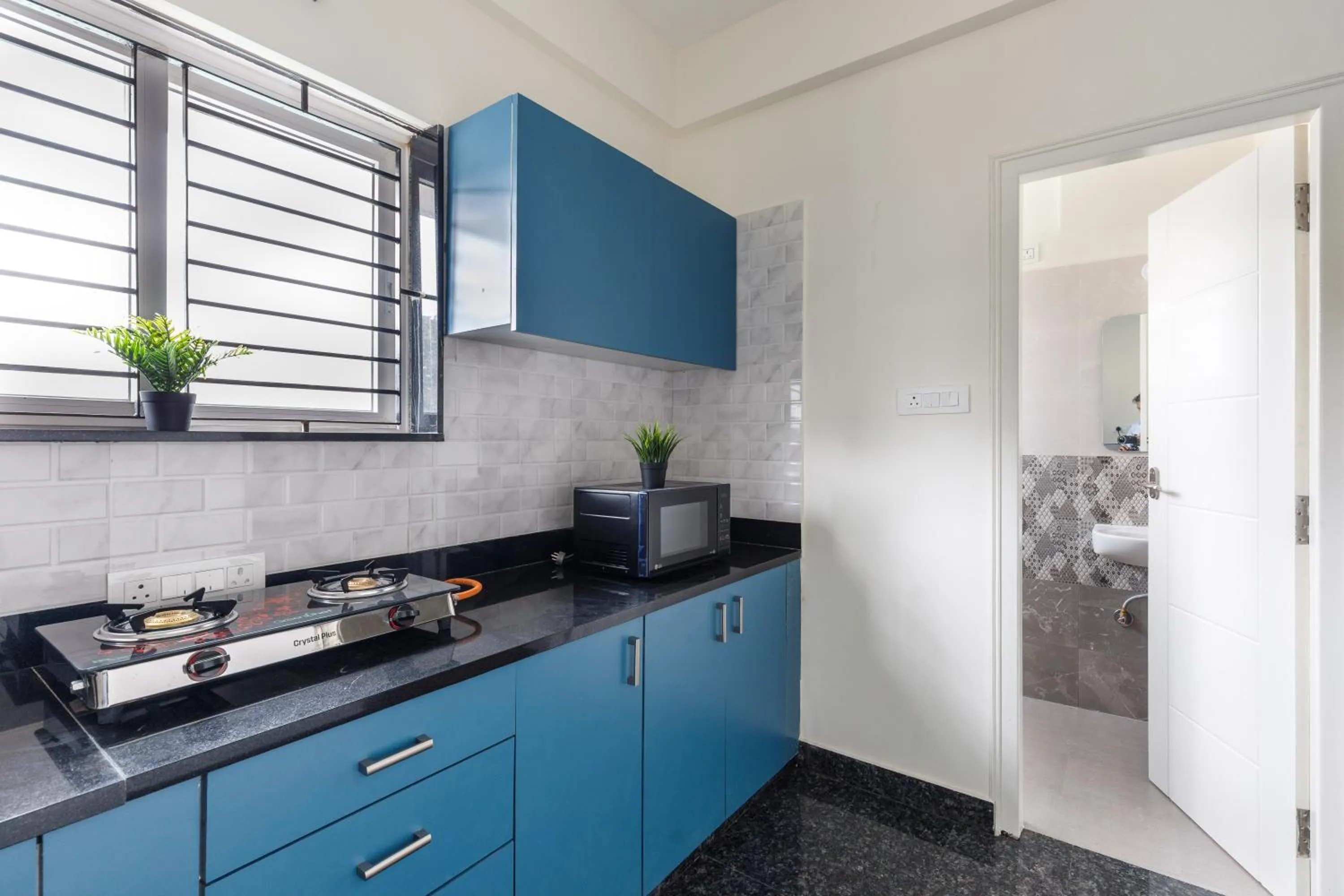 Kitchen or kitchenette in SPLENDID SHUBHAM SERVICED APARTMENTS