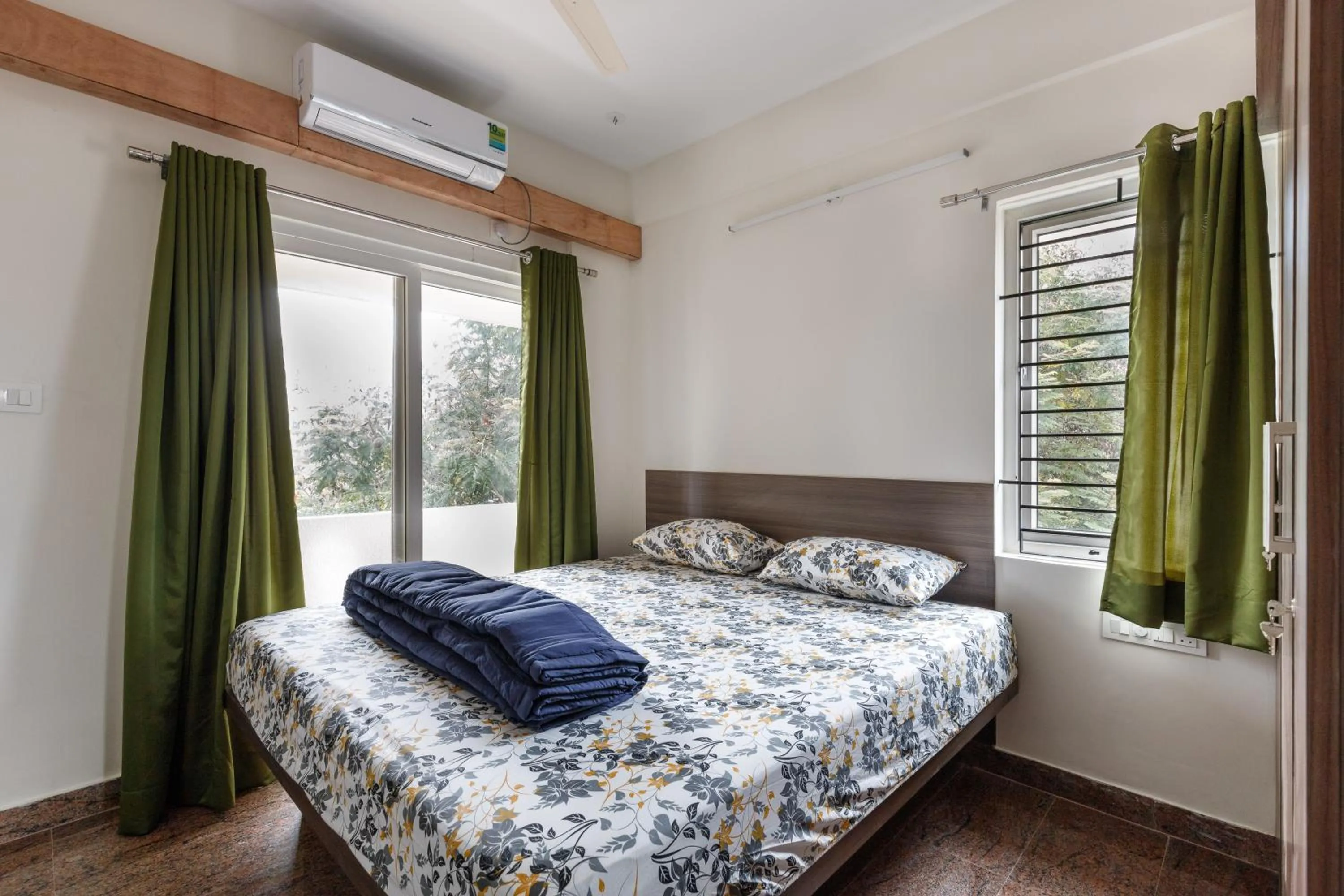 Bed in SPLENDID SHUBHAM SERVICED APARTMENTS