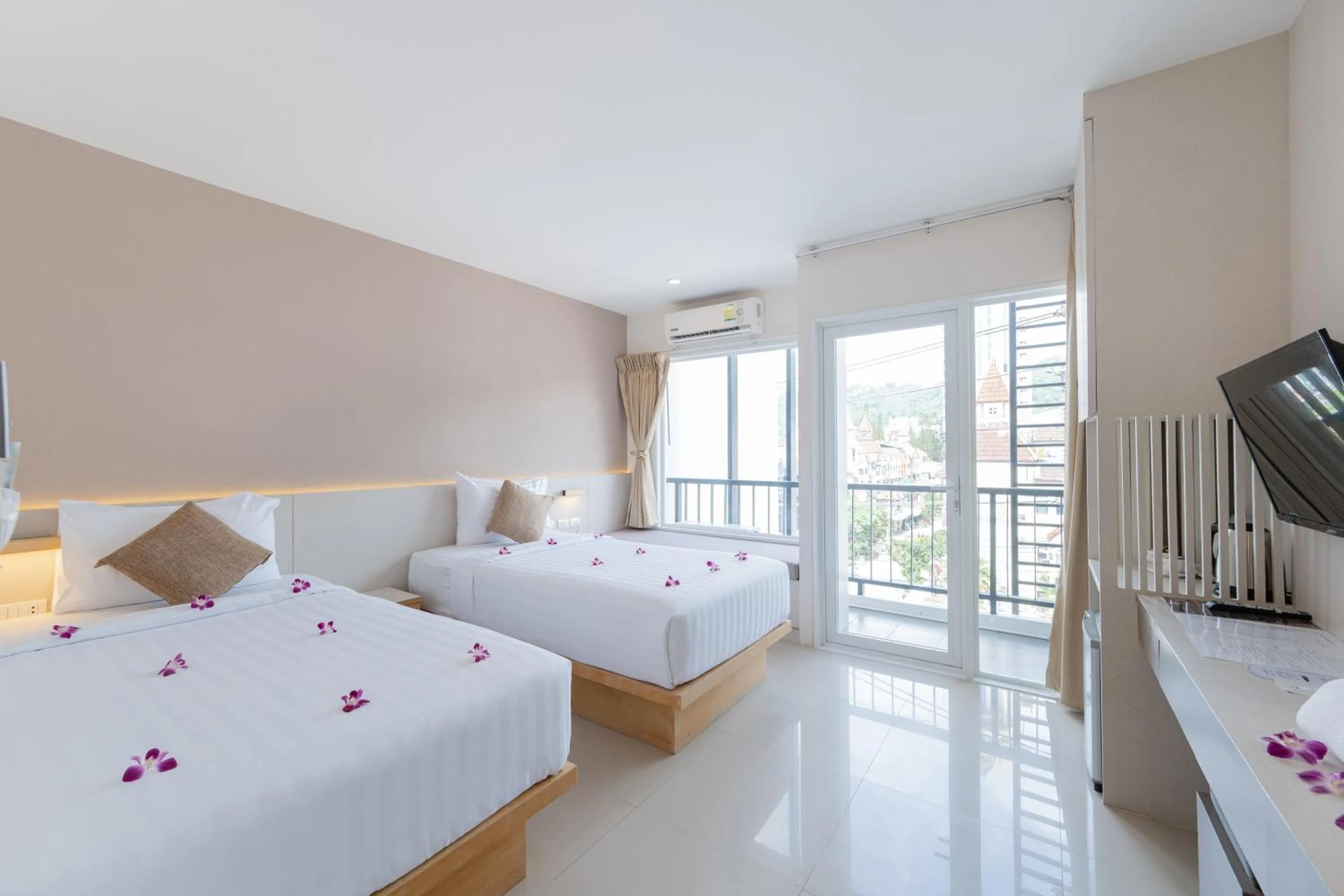 Bed in La Vista Patong Hotel