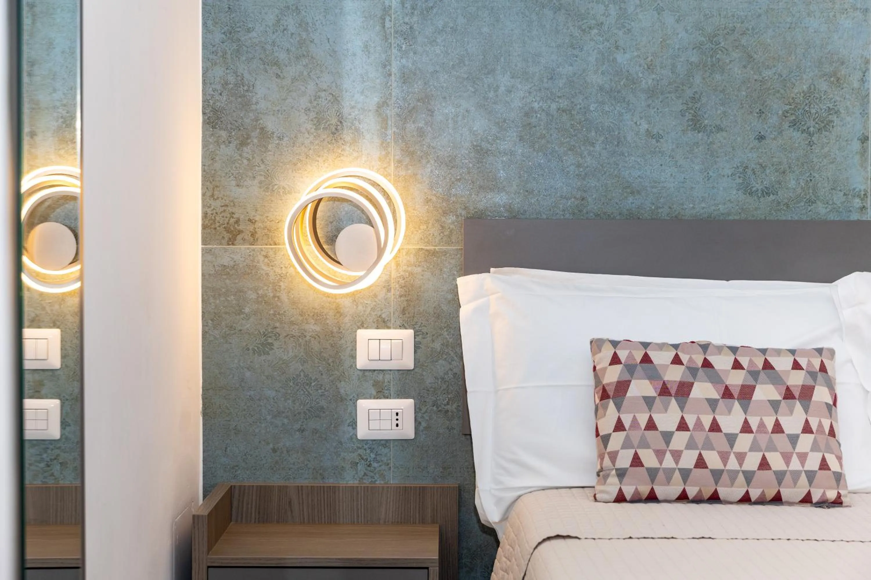 Decorative detail, Bed in Patriziella 4 Rooms