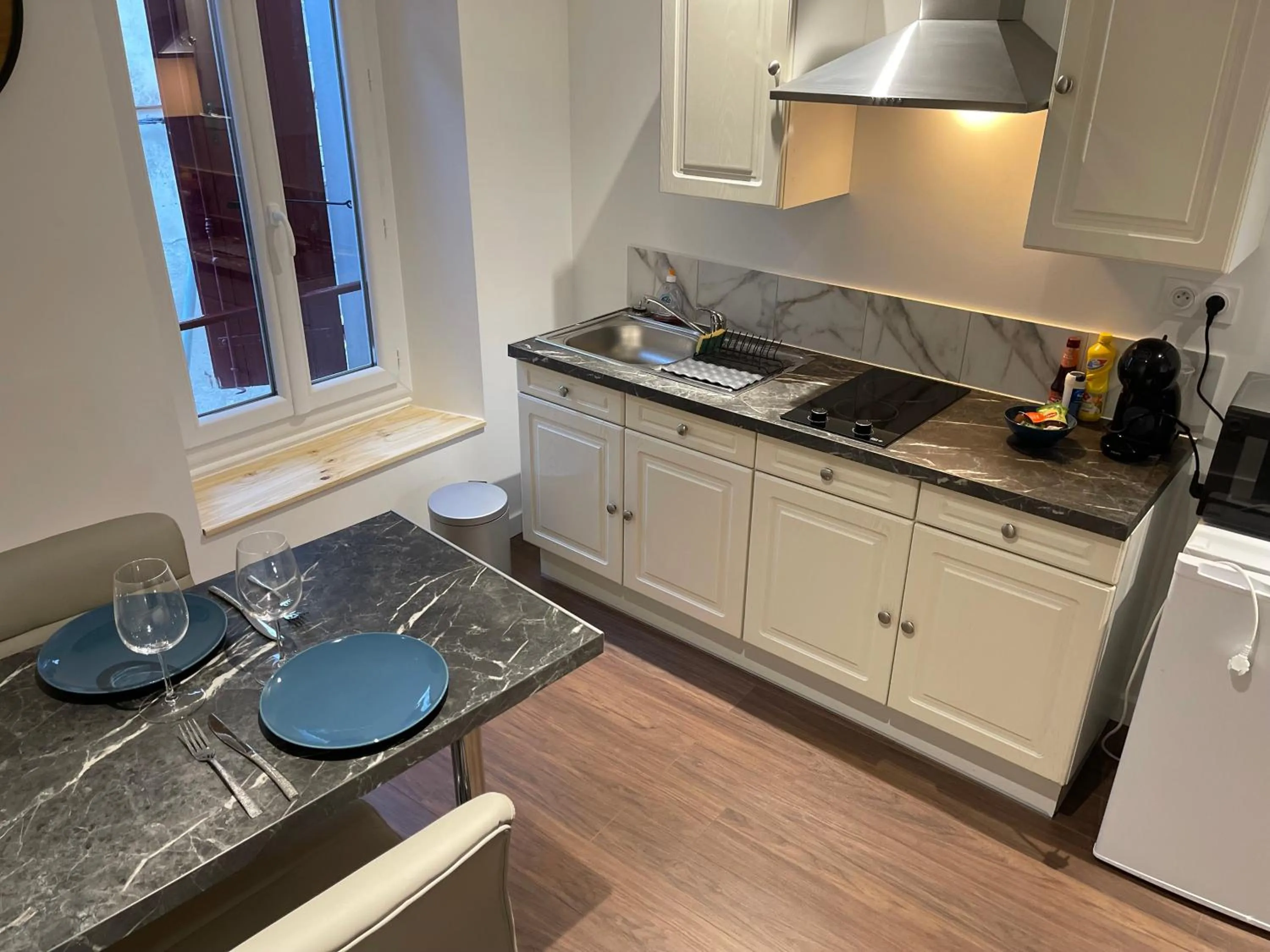 Kitchen or kitchenette in Les Appartements du Cep’t