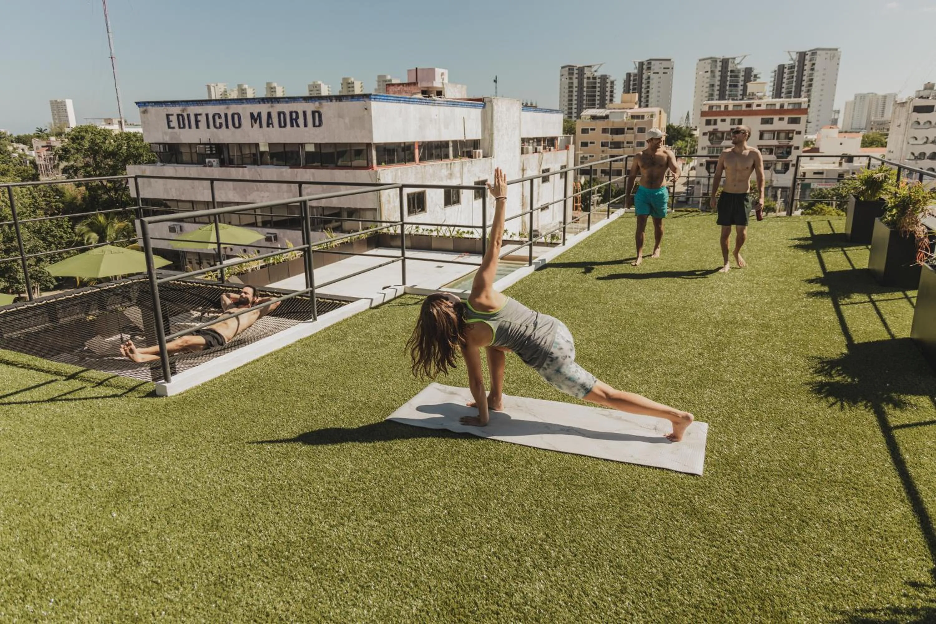 People in Caleta Hostel Rooftop & Pool