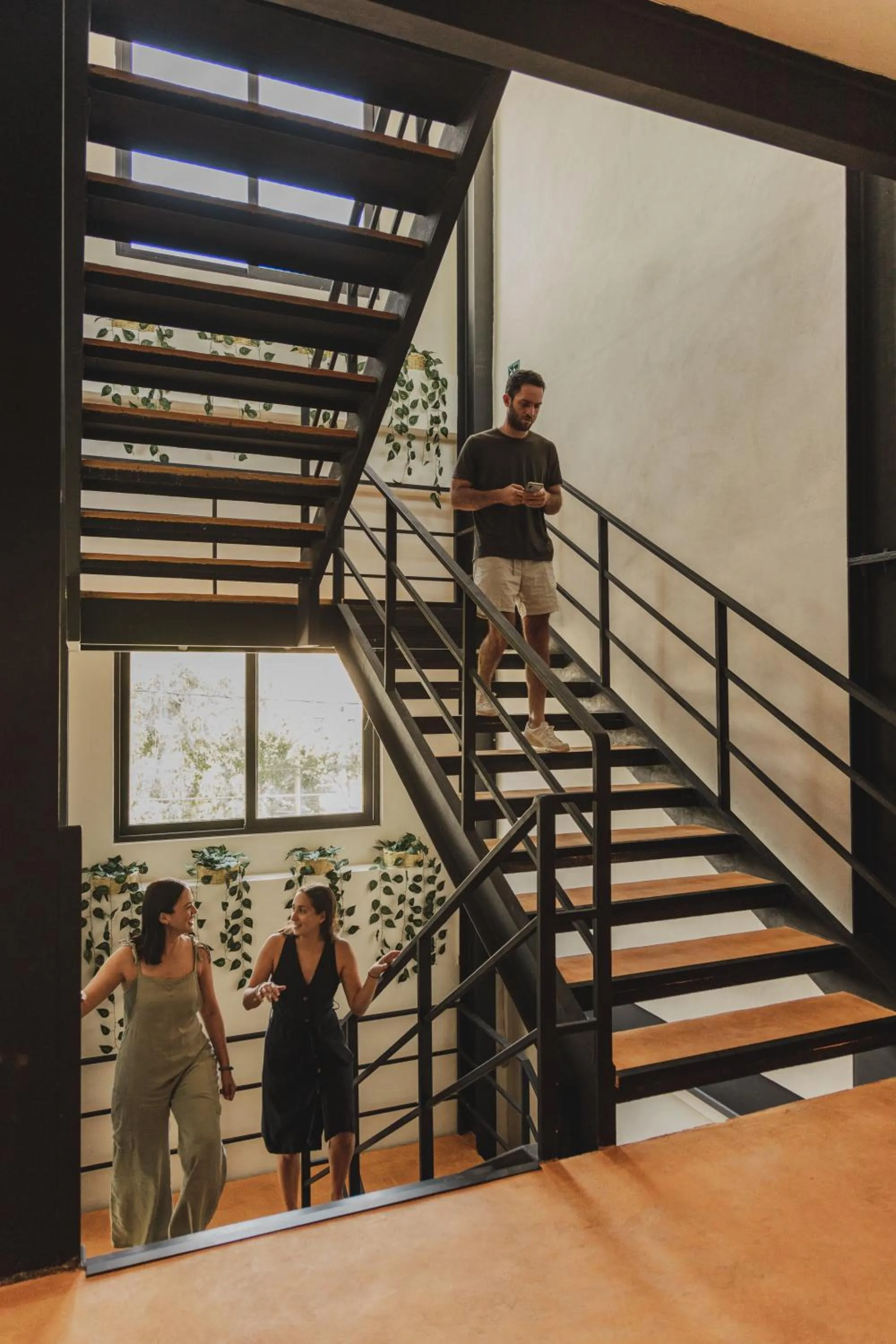 People in Caleta Hostel Rooftop & Pool