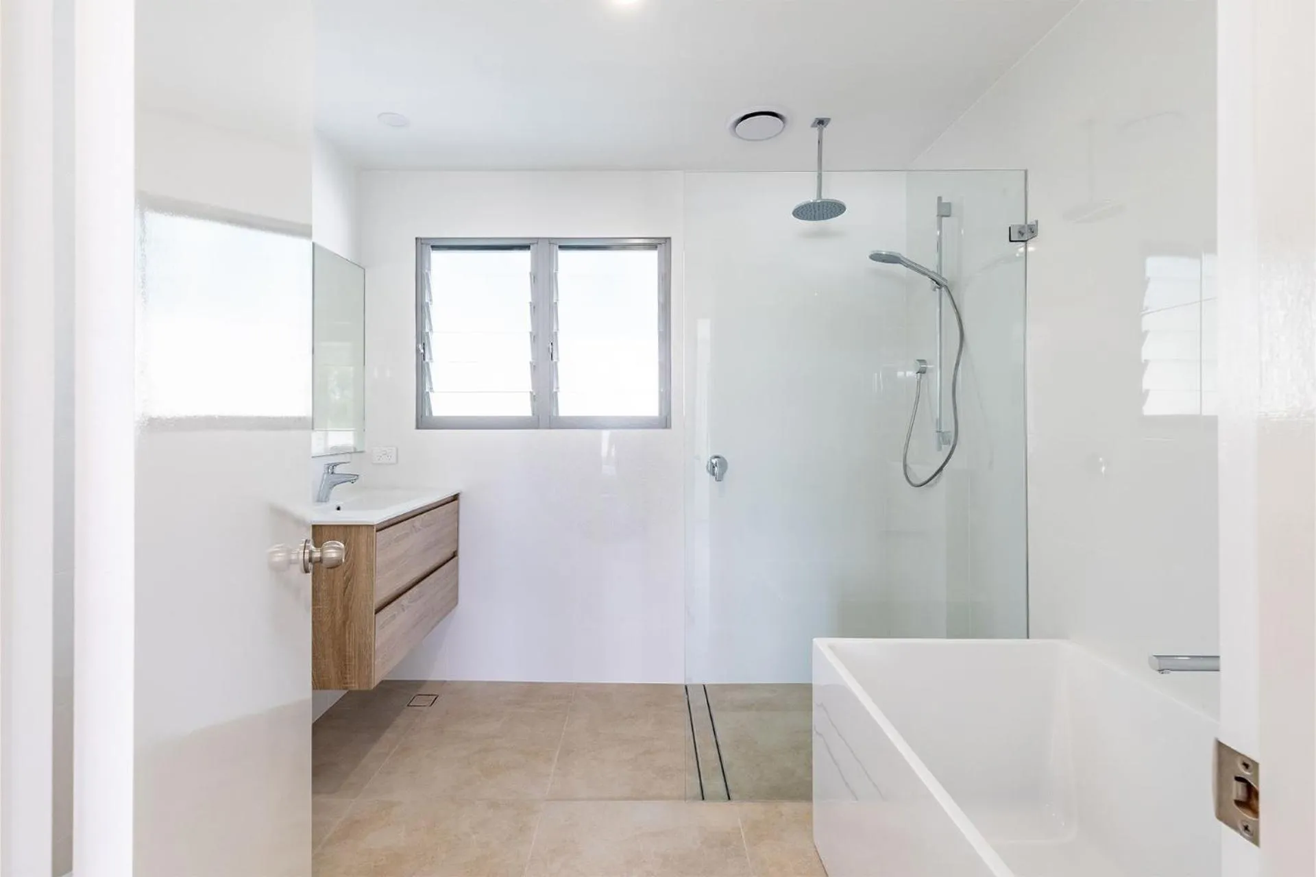 Shower in Five Pines Beach House at Birubi 20 Robinson St pet friendly aircon and WiFi