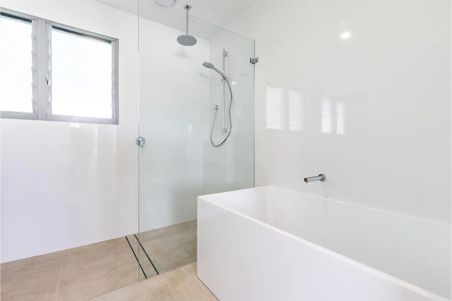 Shower in Five Pines Beach House at Birubi 20 Robinson St pet friendly aircon and WiFi