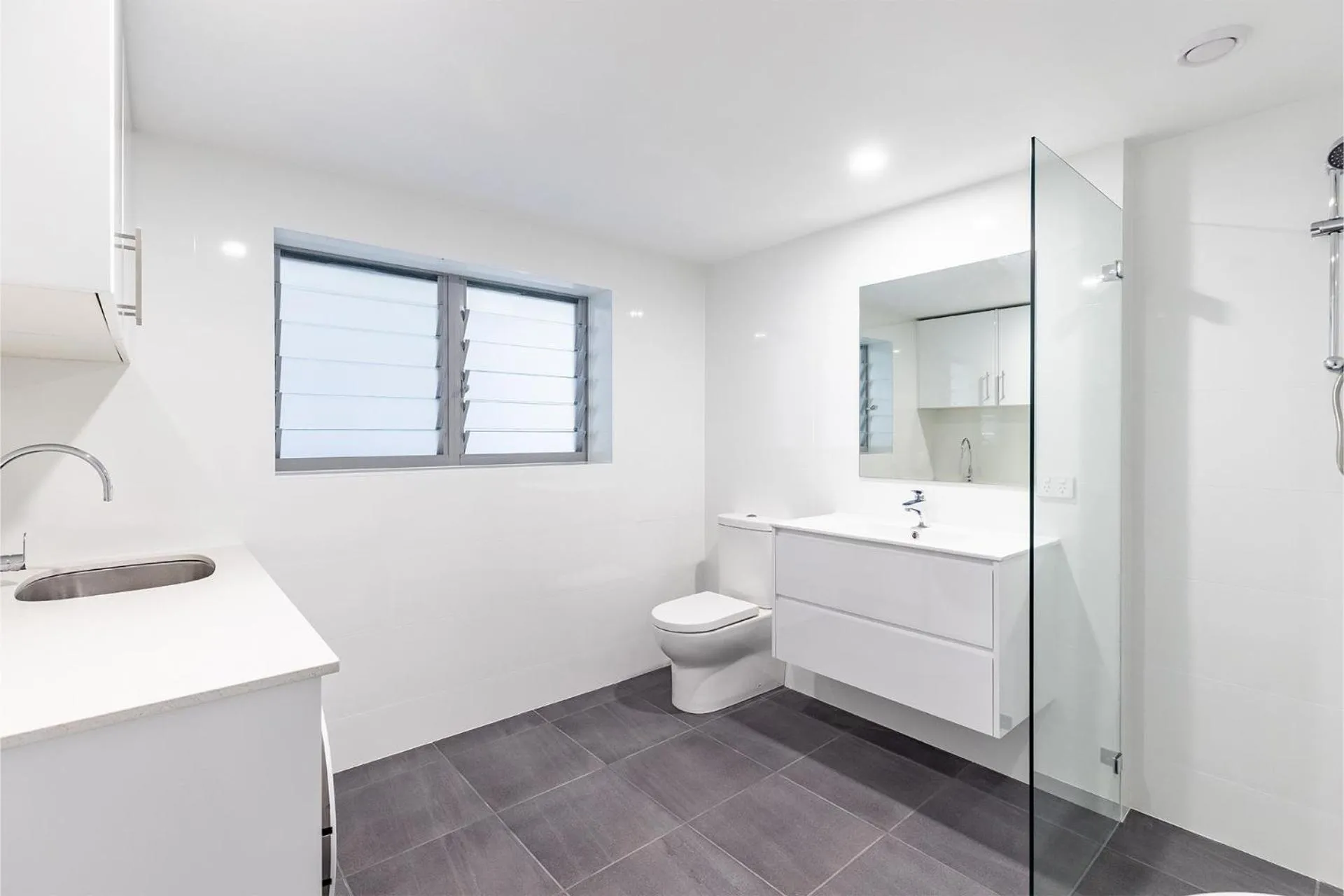 Shower in Five Pines Beach House at Birubi 20 Robinson St pet friendly aircon and WiFi