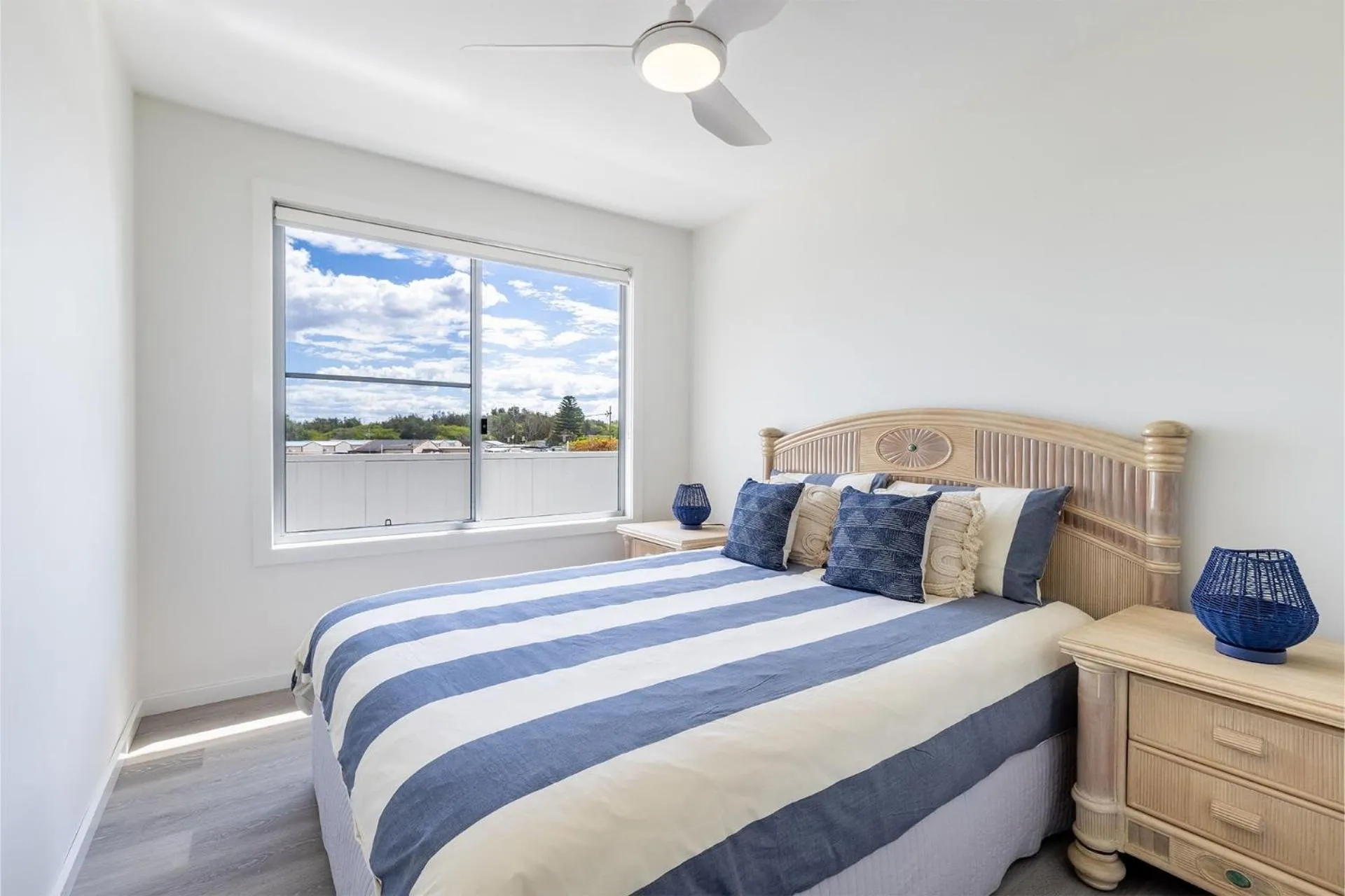 Bed in Five Pines Beach House at Birubi 20 Robinson St pet friendly aircon and WiFi