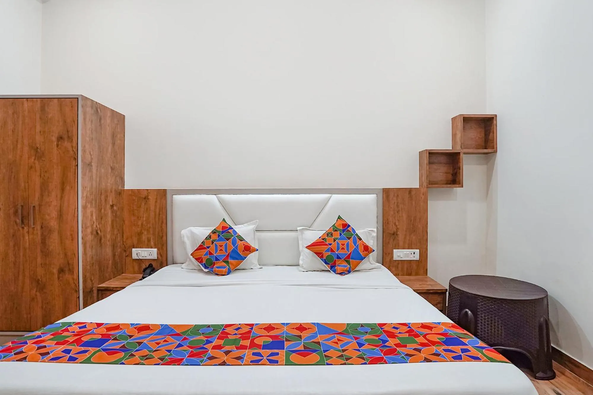 Bed in FabHotel Sirtaj Suits