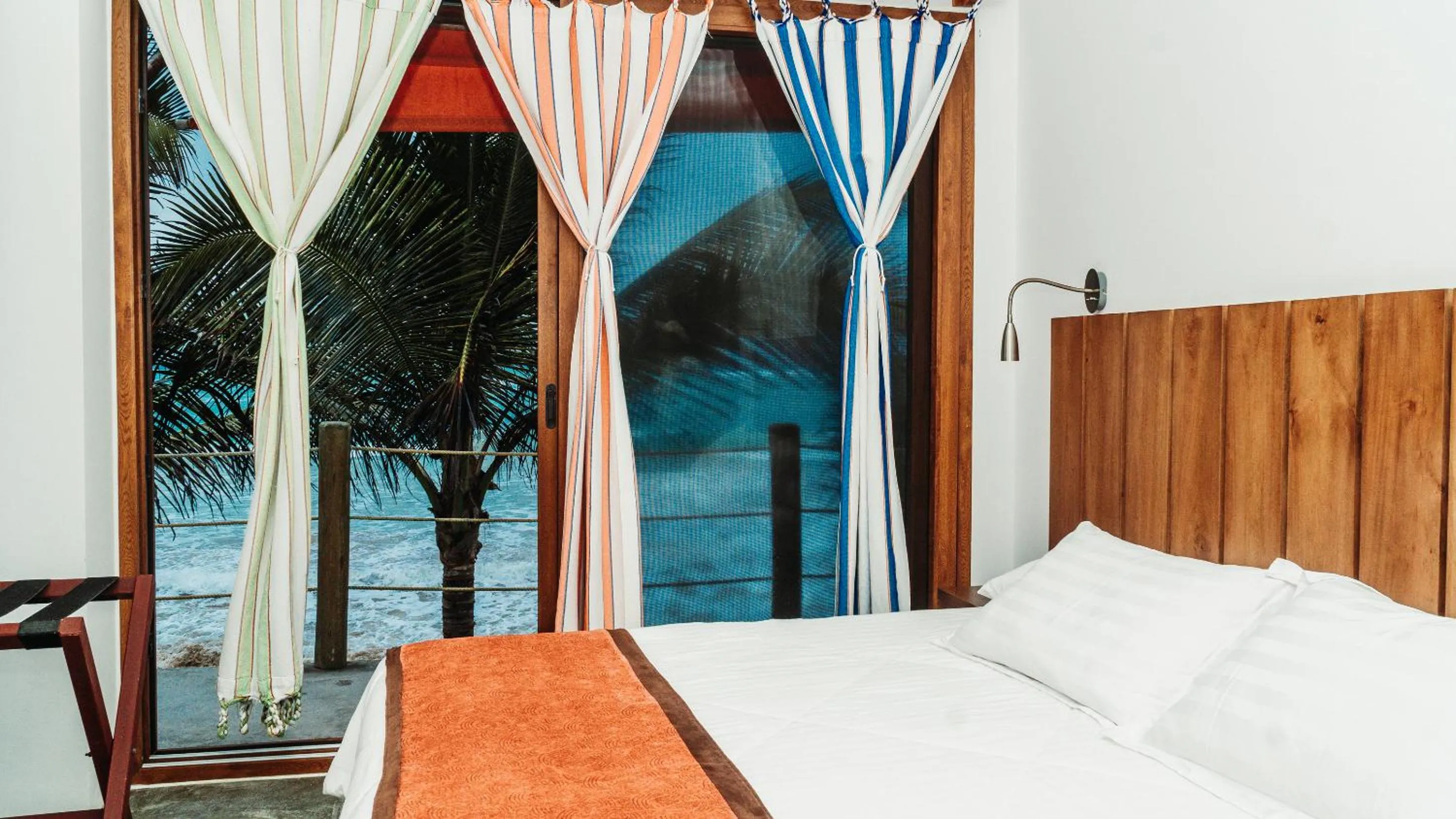 Bed in Mi Playa Galapagos Beachfront Apartments