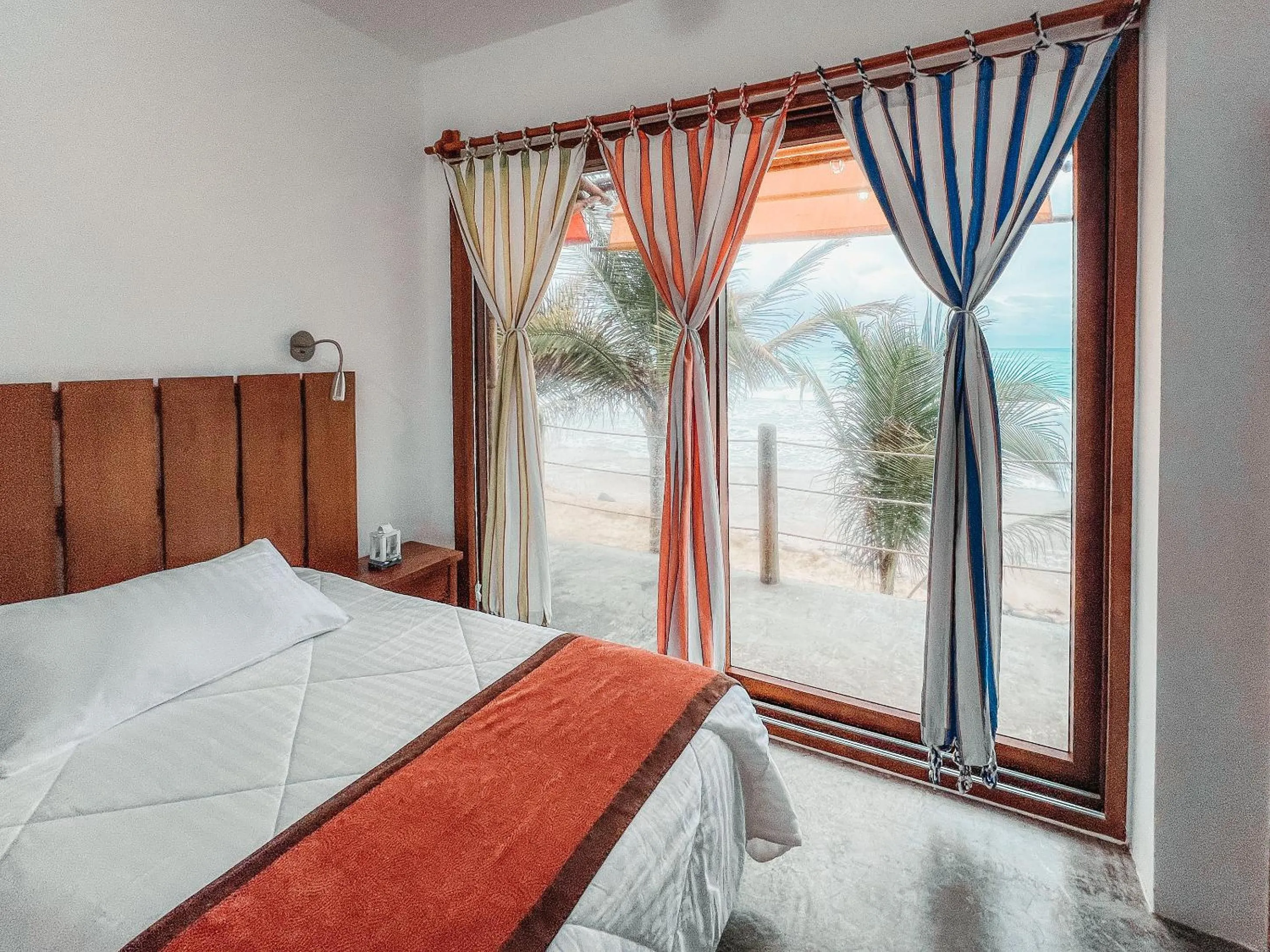 Bed in Mi Playa Galapagos Beachfront Apartments